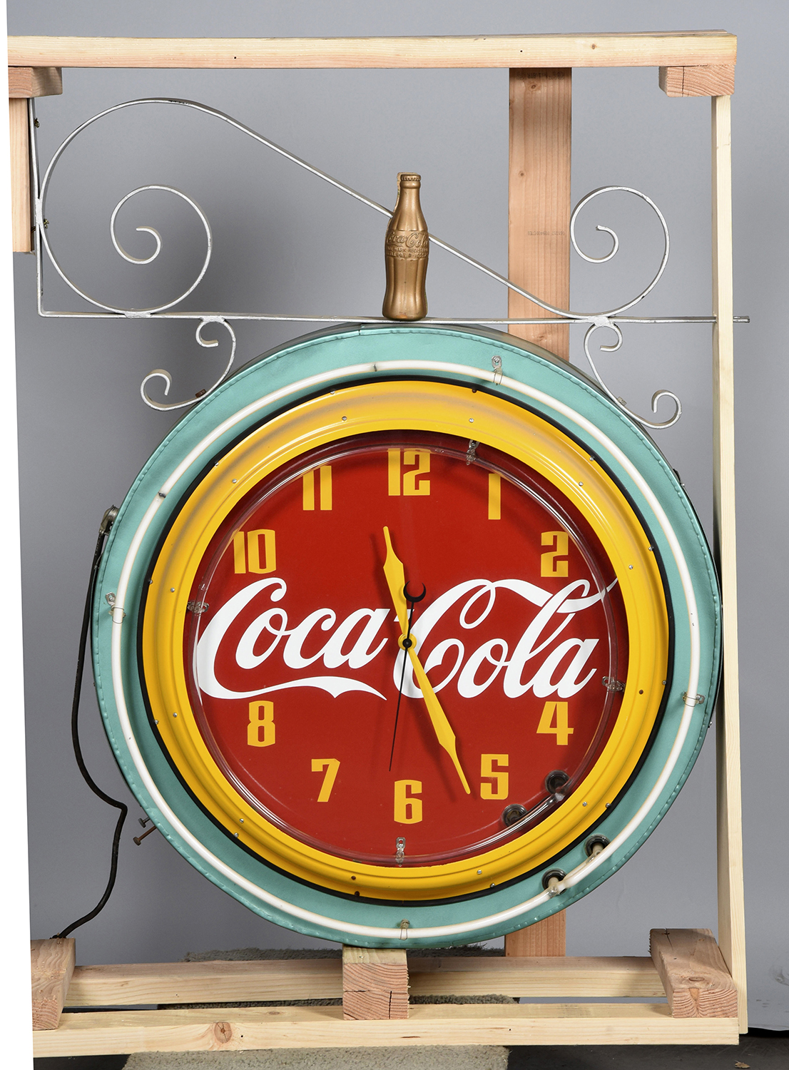 Coca-Cola Neon Clock with Hanging Bracket, Estimated at $25,000-40,000.