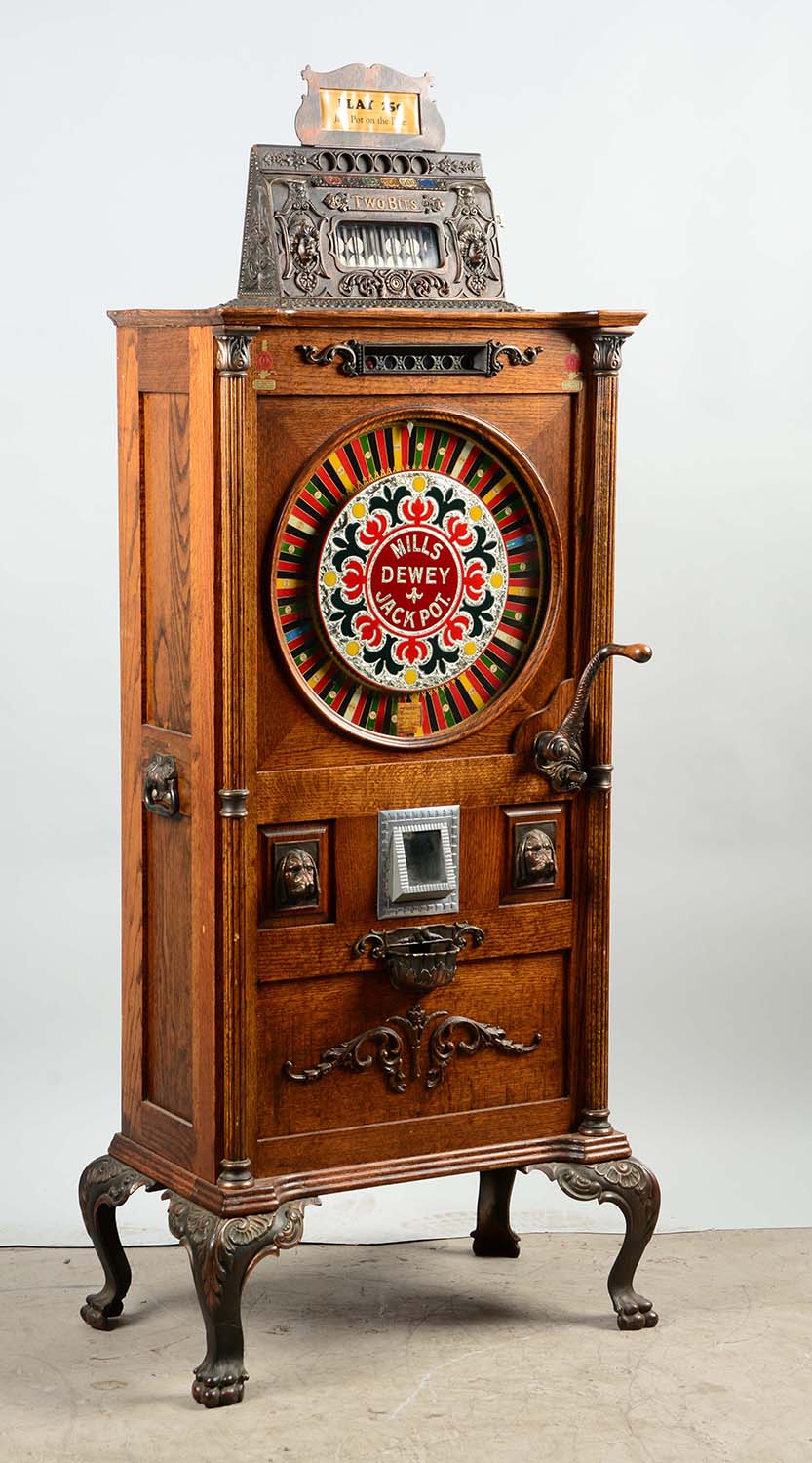 25¢ Mills Dewey Jackpot Upright Slot Machine, Estimated at $18,000-25,000.