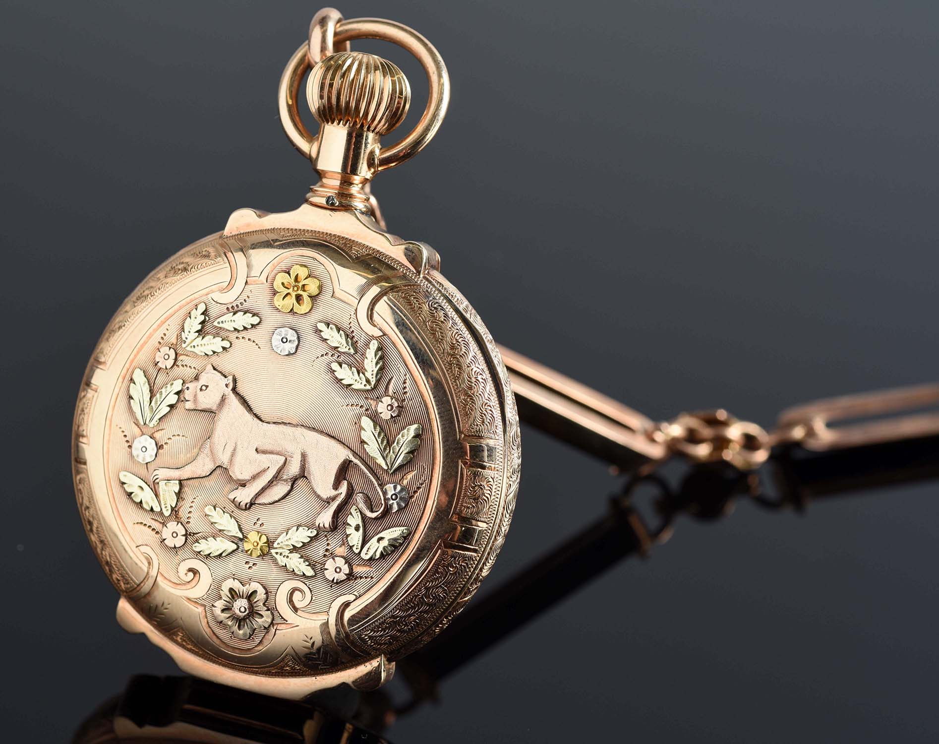 Elgin 14K Gold Pocket Watch & Gold Quartz Chain, Estimated at $6,000-10,000.