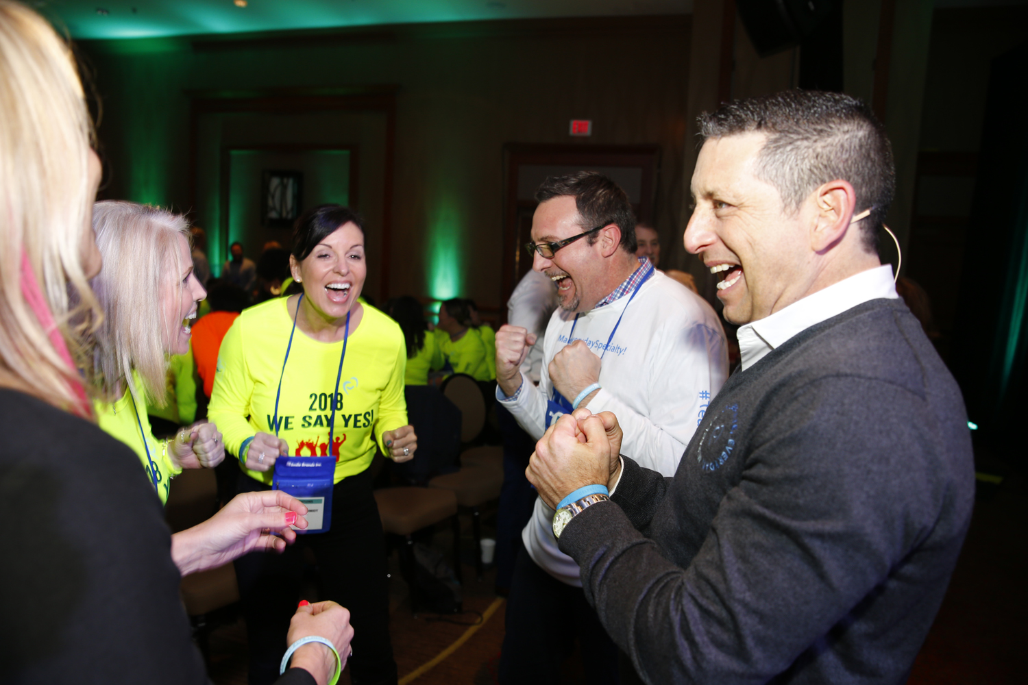 Steve Bilt, co-founder and CEO, embracing the theme of "Get Loud" with Smile Brands team members