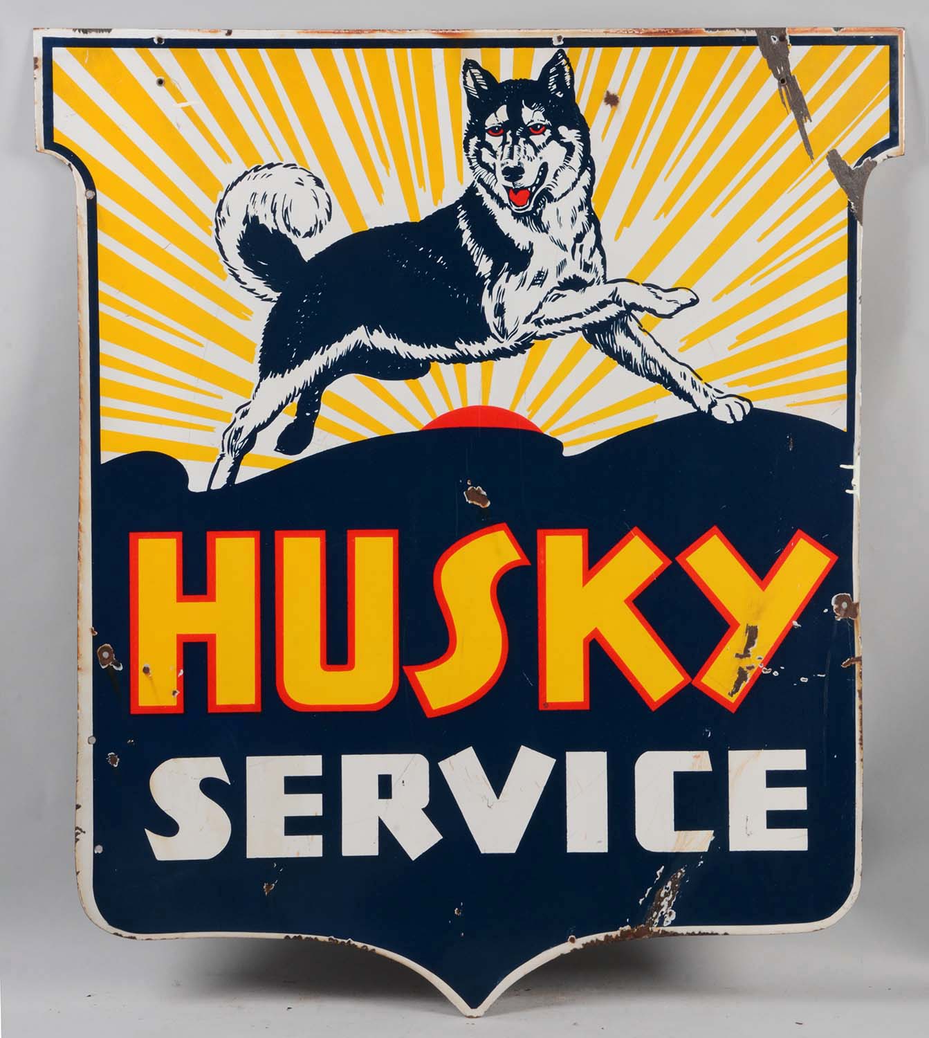 Husky Gasoline Service Porcelain Shield Sign, estimated at $10,000-15,000.
