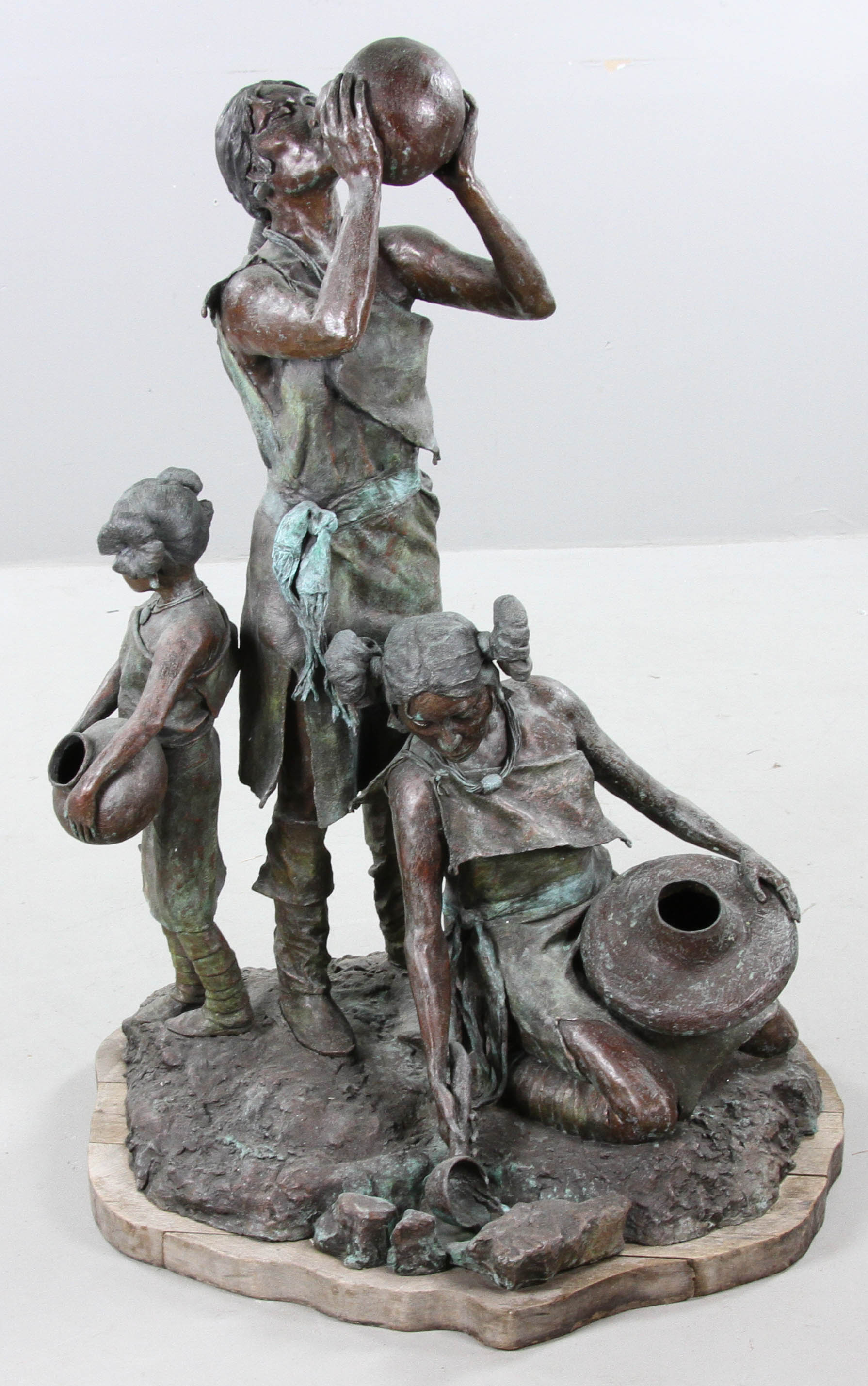 large bronze sculpture by Daro Flood, titled “Desert Water”