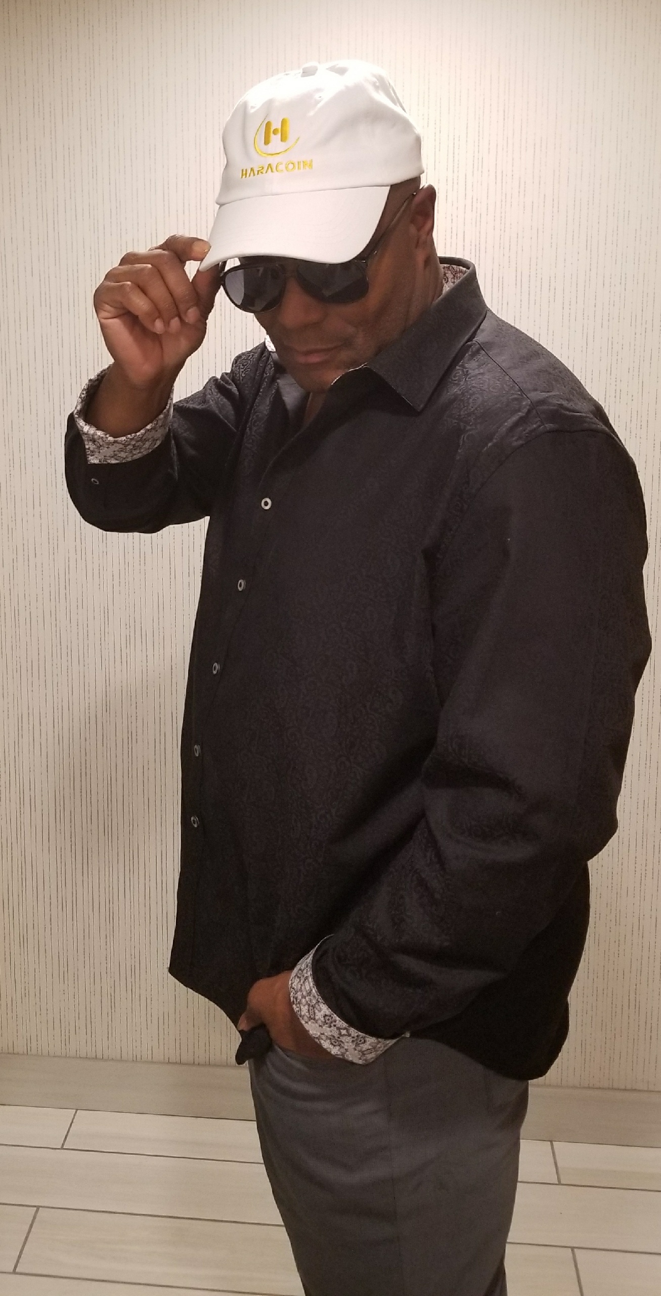 Willie Stewart, Manager for 3Dimensional sports a Haracoin lid in celebration of a successful 3Dimensional performance during the 2018 Sundance Film Festival