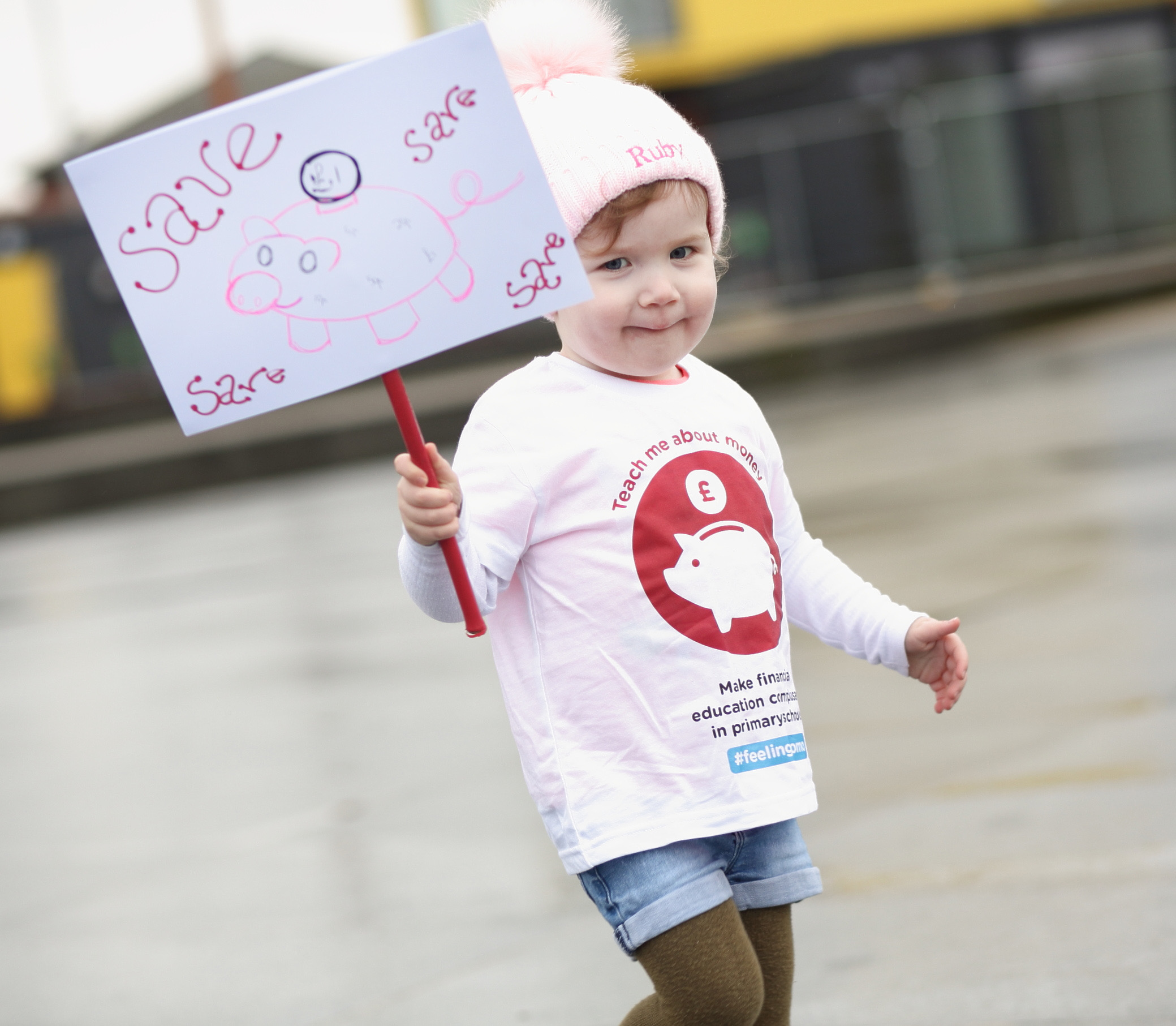 Ruby Kelly (age 2) takes to the streets, petitioning for financial education to be made compulsory in UK primary schools