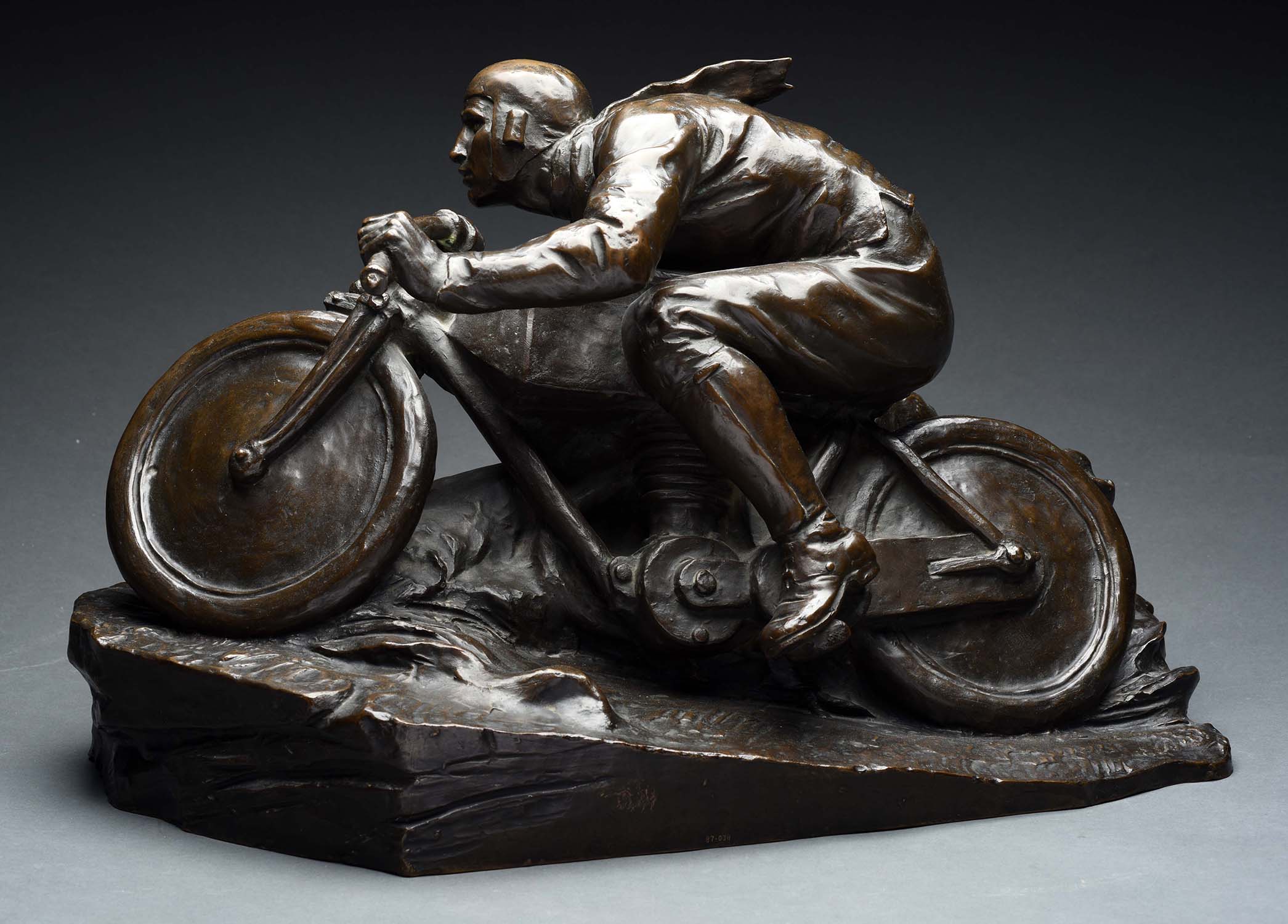 Full Figure Bronze Motorcycle Statue, estimated at $4,000-6,000.