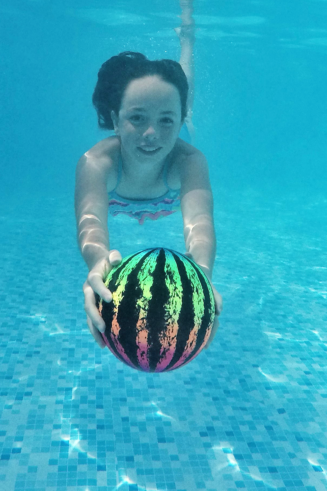 Watermelon Ball JR is smaller, lighter, highly visible in water