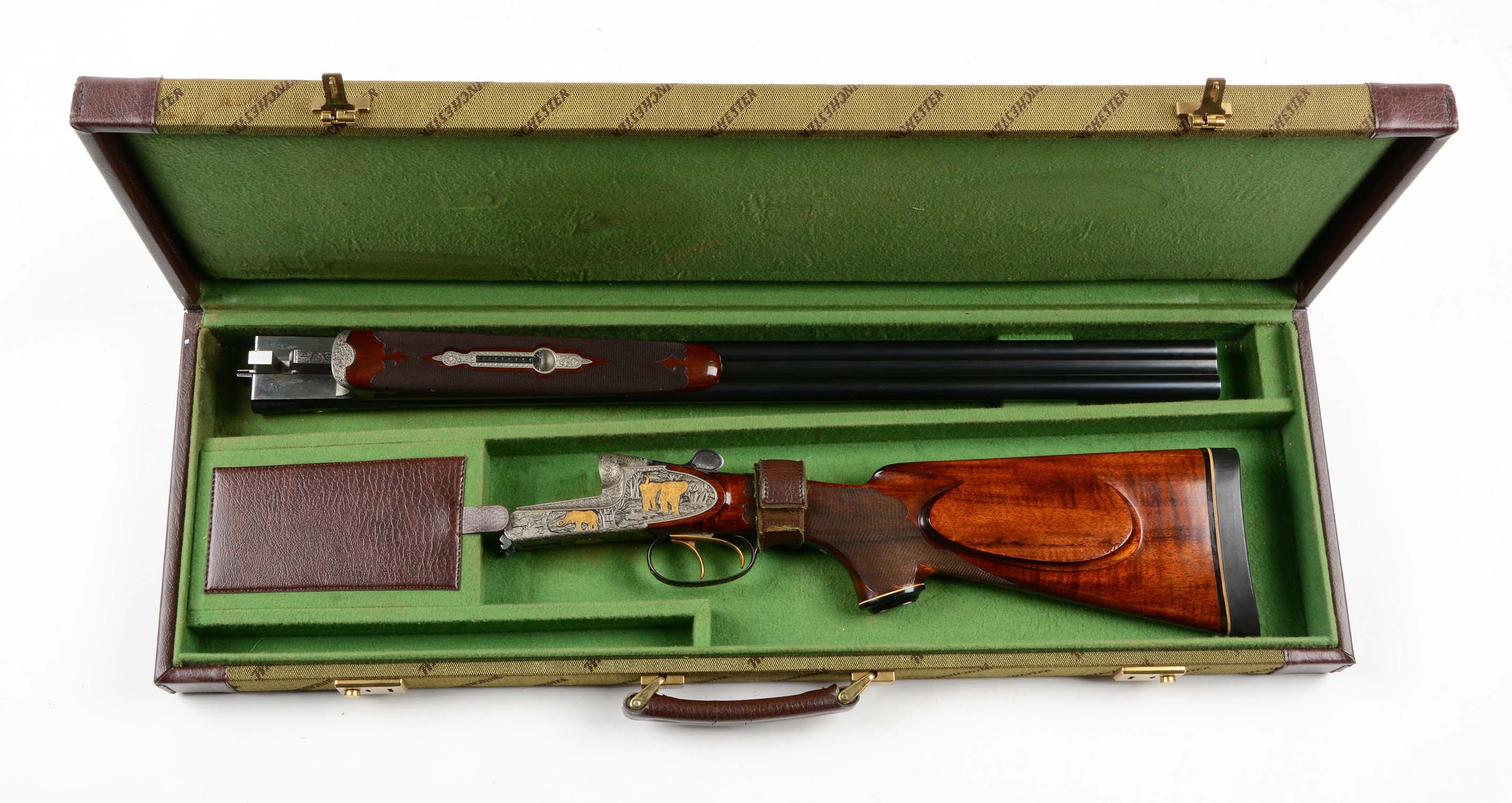 Cased Engraved and Inlaid Franz Sodia .458 Win Mag SxS Double Rifle, estimated at $25,000-35,000.