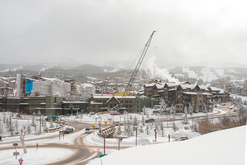 The construction crane goes up after the recent snowfall on One Snowmass – the latest project now underway at Snowmass Base Village.