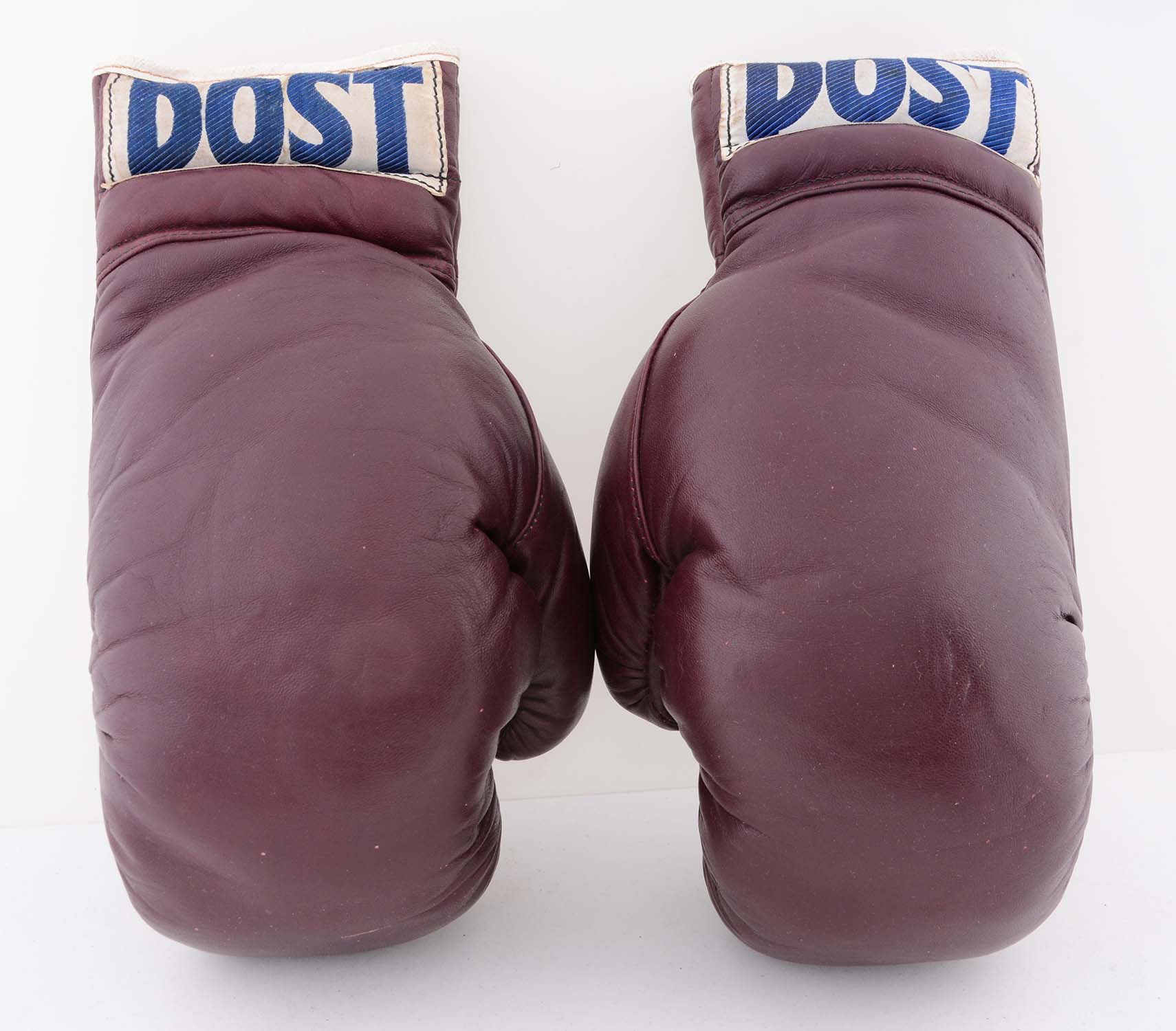1950's Cassius Clay Amateur Training Gloves, estimated at $3,000-5,000.
