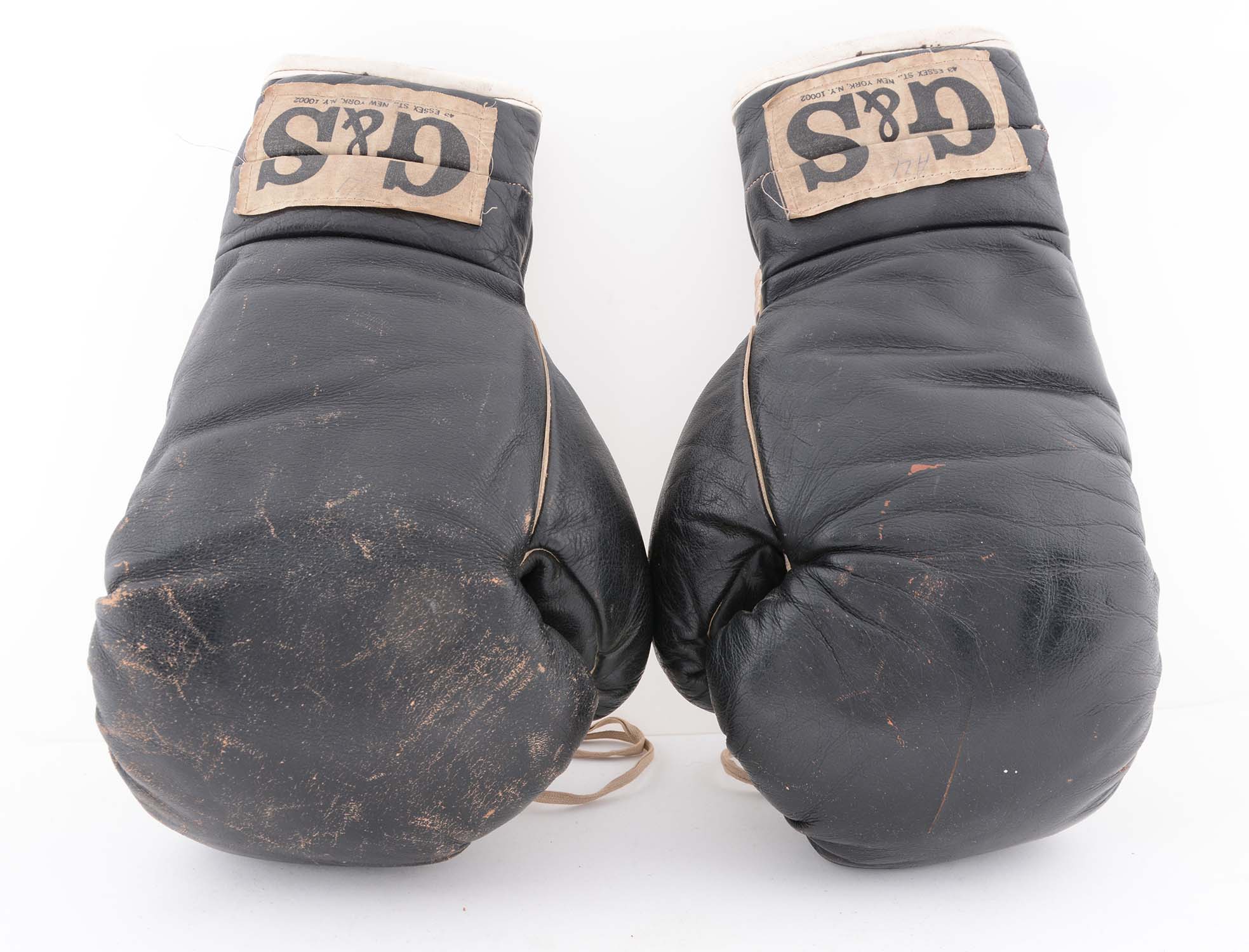 1972 Era Muhammad Ali Sparring Gloves, estimated at $3,000-6,000.