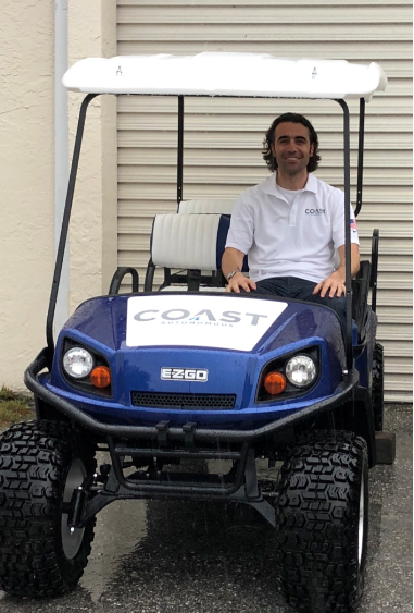 Dario Franchitti on a Coast Autonomous self-driving golf cart.