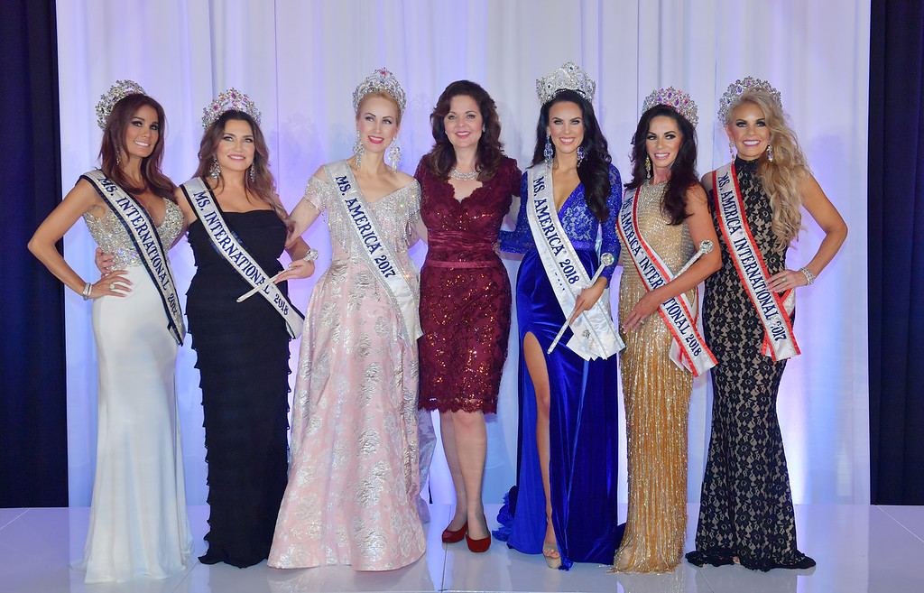 CEO of the Ms. America® Pageant Inc. Susan Jeske (middle) with 2017 and 2018 title holders at the Queen Mary in Long Beach, California.