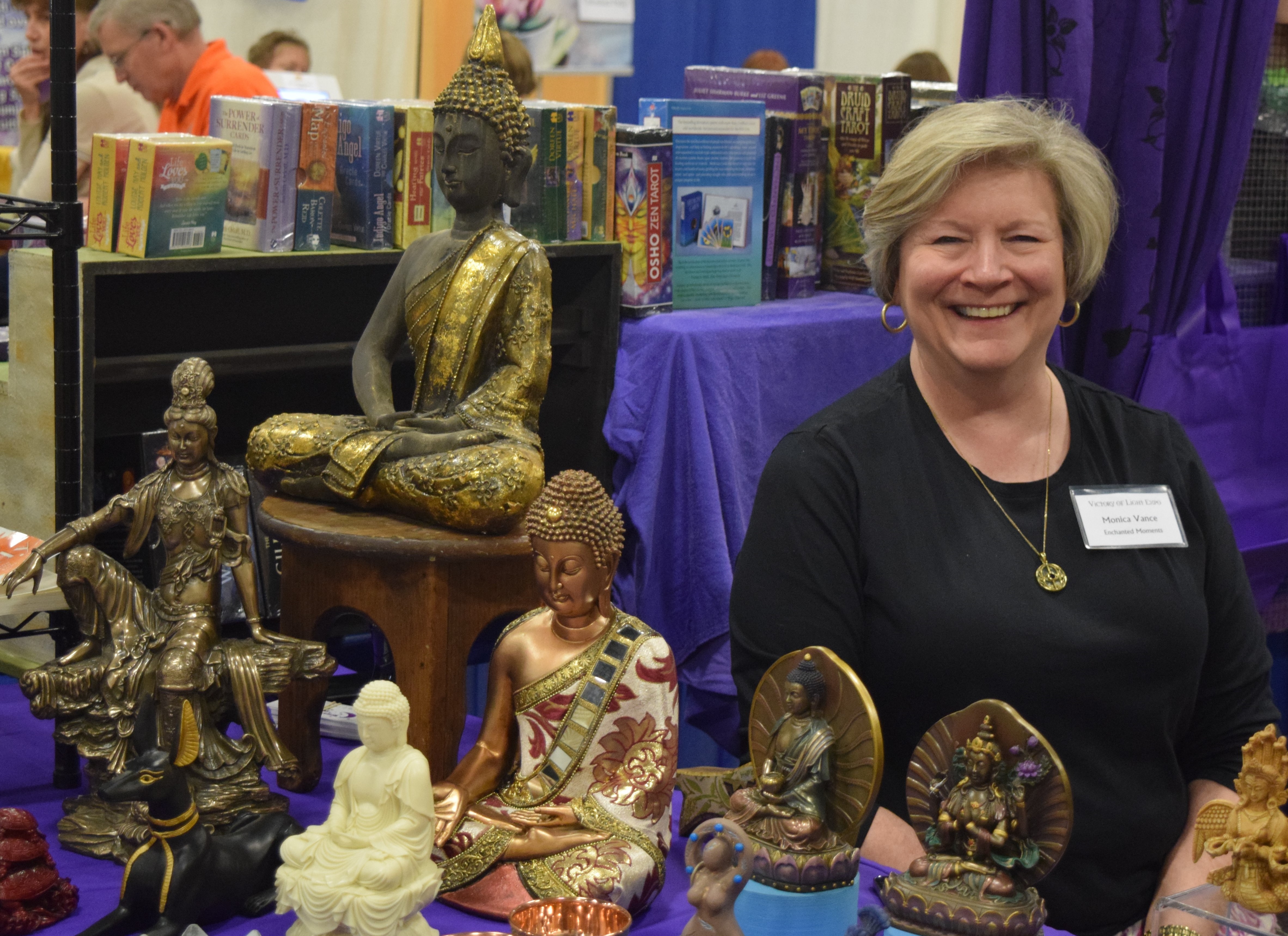 A vendor specializing in Buddhas at Victory of Light.