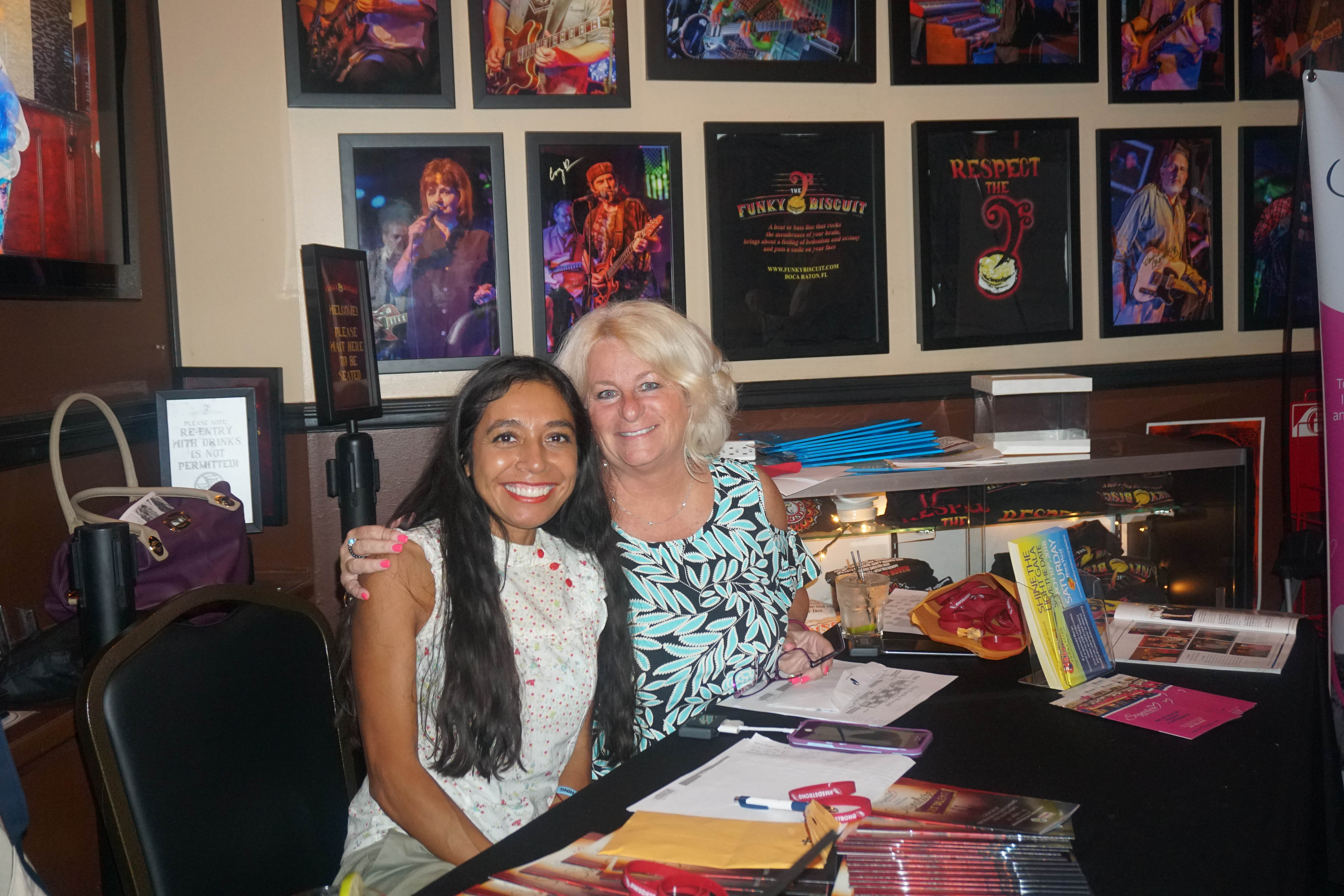 SREC staffers Rachel Morales and Heidi Willson Boost Donations at The Funky Biscuit "Signature's Got Talent Show."
