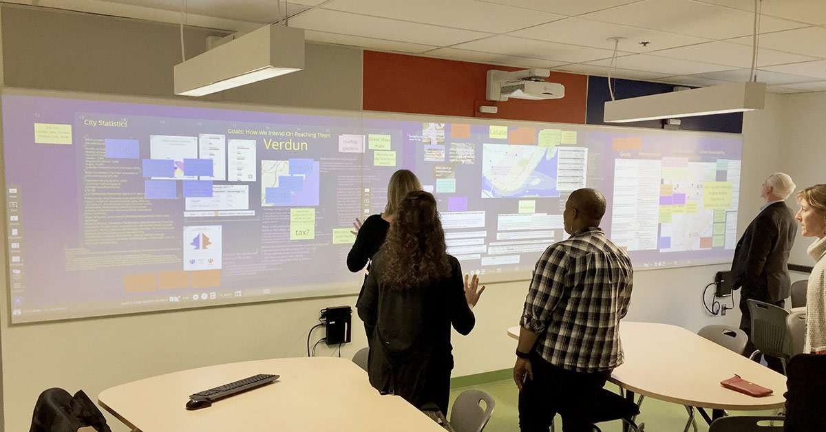 Students using the Nureva visual collaboration system in the Active-Learning Classroom at Dawson College.
