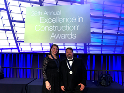On behalf of Manhattan Construction Company, Safety Managers Trista Shomo and Scott March accepted the National Safety Pinnacle Award from the Associated Builders and Contractors.