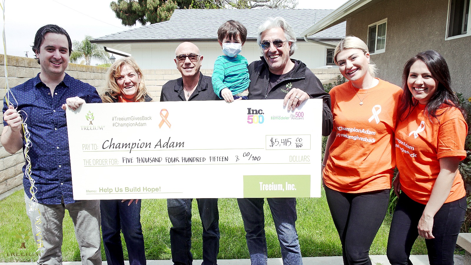 Delivering the  funds to Adam's family collected for Adam's medical bills by Treeium employees, family and friends.