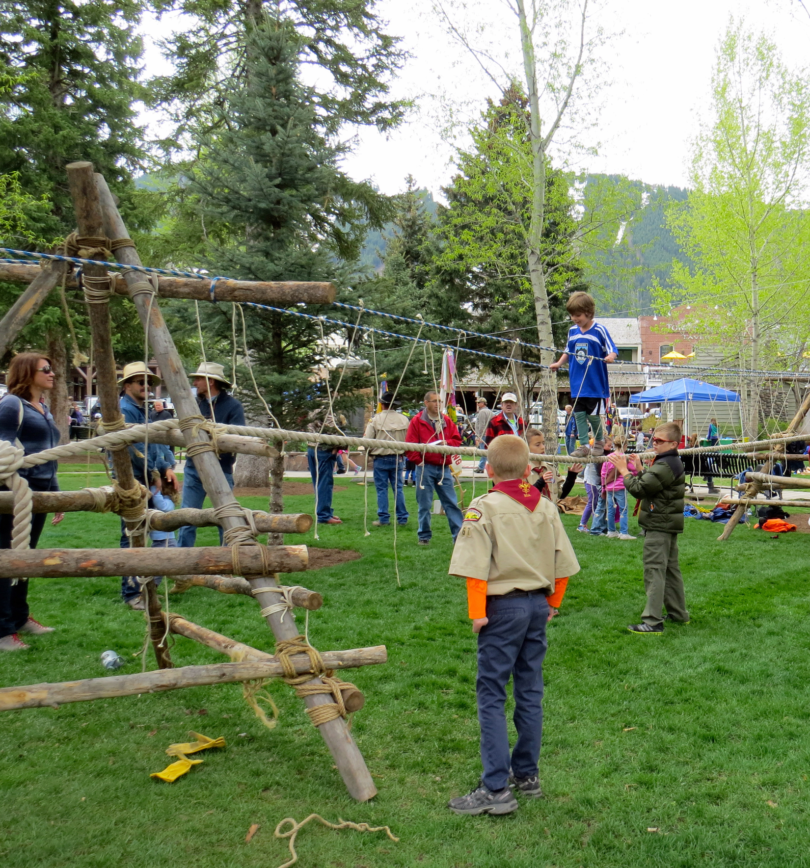 Kids from all around fill the famous Town Square lawn enjoying fun interactive and educational activities during ElkFest and Old West Days in Jackson Hole, Wyoming.