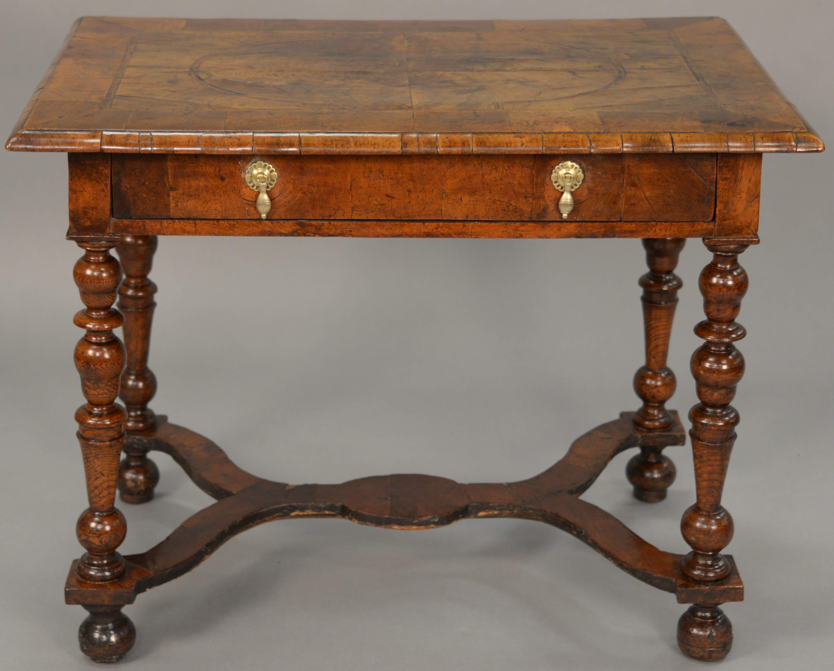 Queen Anne walnut veneered dressing table, estimated at $300-500.
