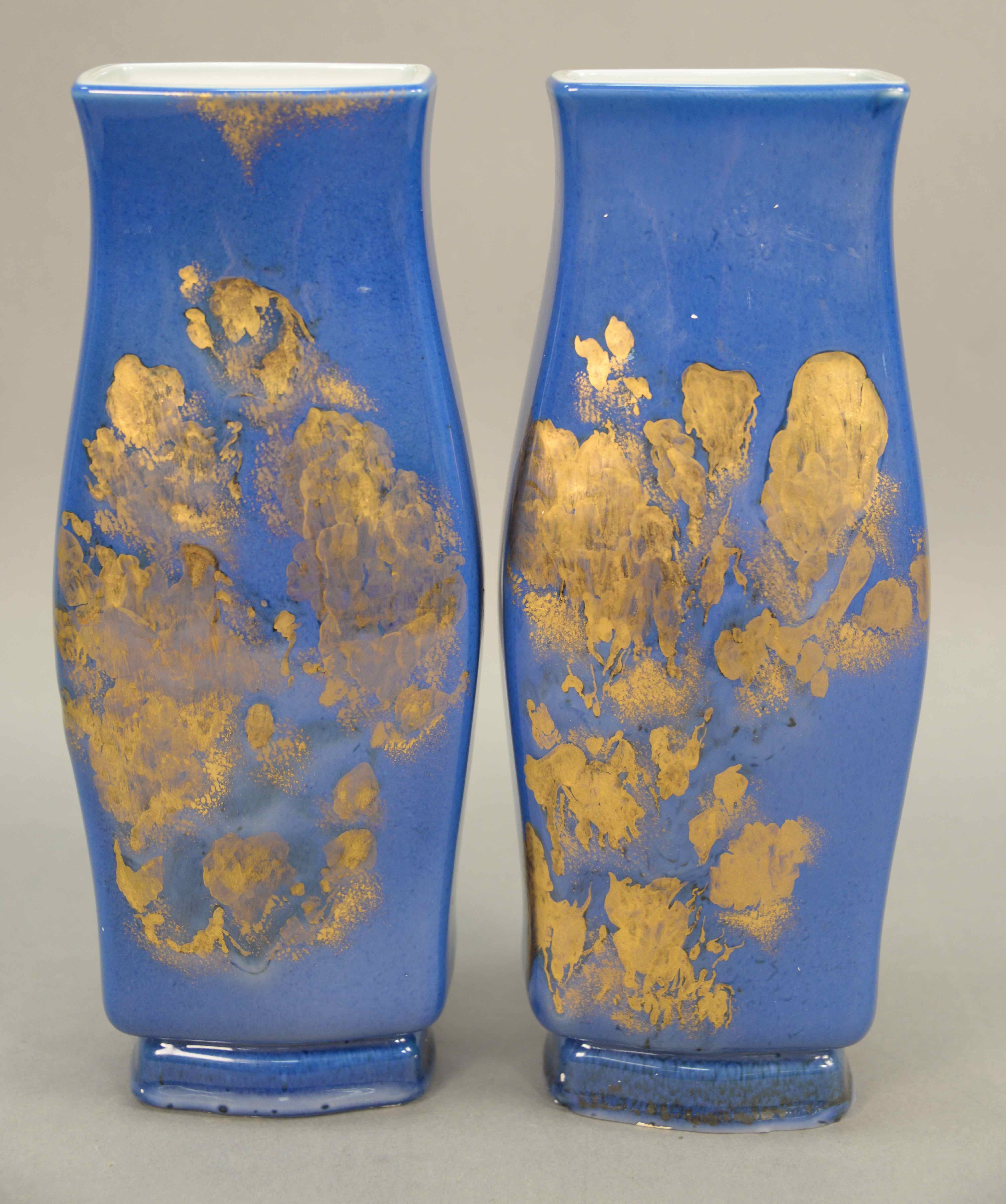 Pair of Sevres Mahieddine Boutaleb porcelain vases, estimated at $2,000-4,000.