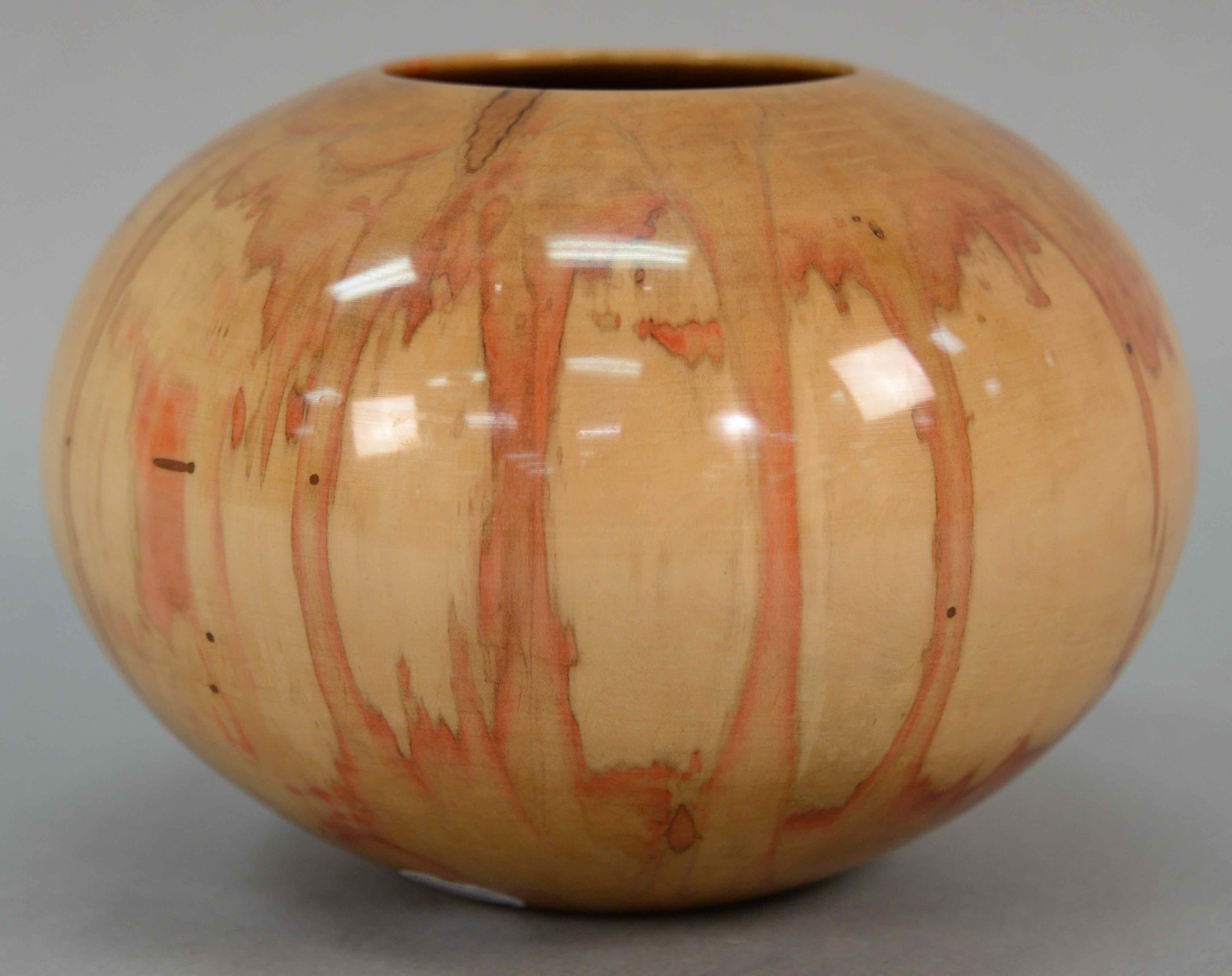Philip Moulthrop (b. 1947), large turned wooden bowl/vase, estimated at $500-1,000.