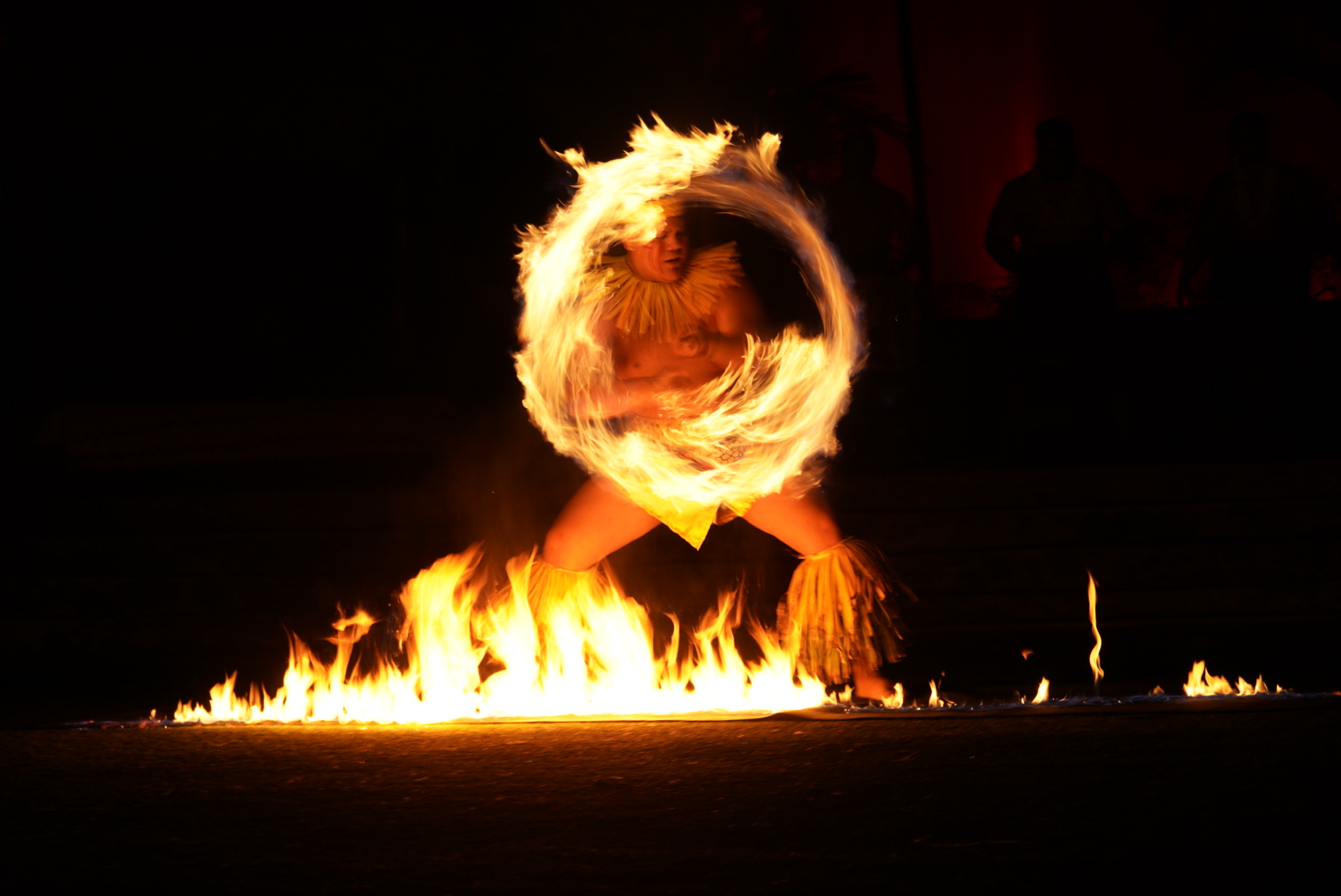 Hale Motuapuaka of Aiea, Hawaii showcases his warrior skill and agility during heated performance.