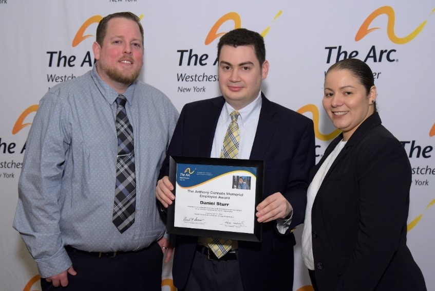 Daniel Sturr, center, was one of two individuals honored with the Anthony Cannata Memorial Employee Award. Daniel is an employee of Regeneron.