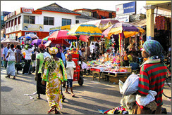 People walking and shoppers in Ghana's capital (Accra)