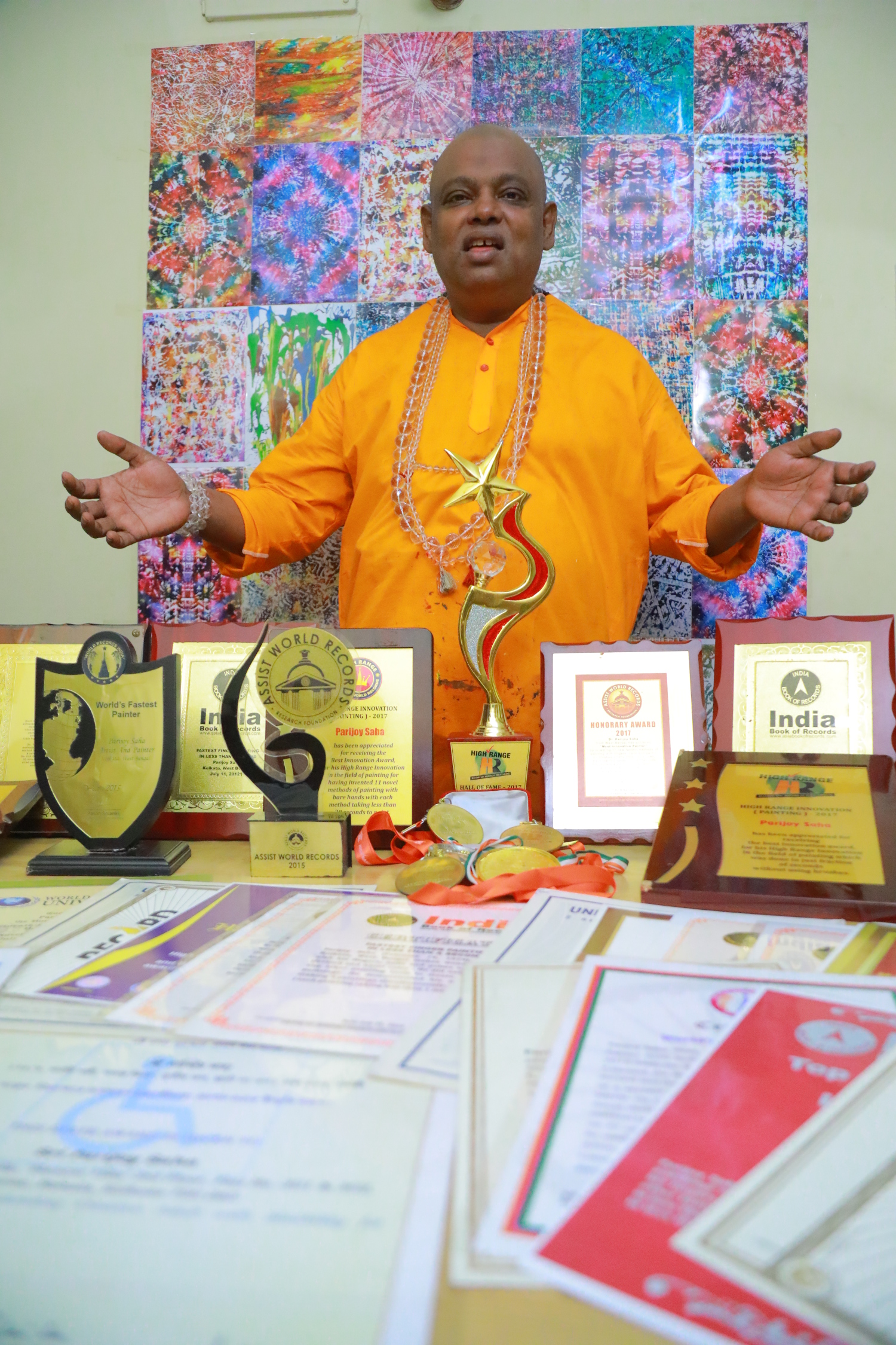 Parijoy Saha with his world record certificates and awards.
