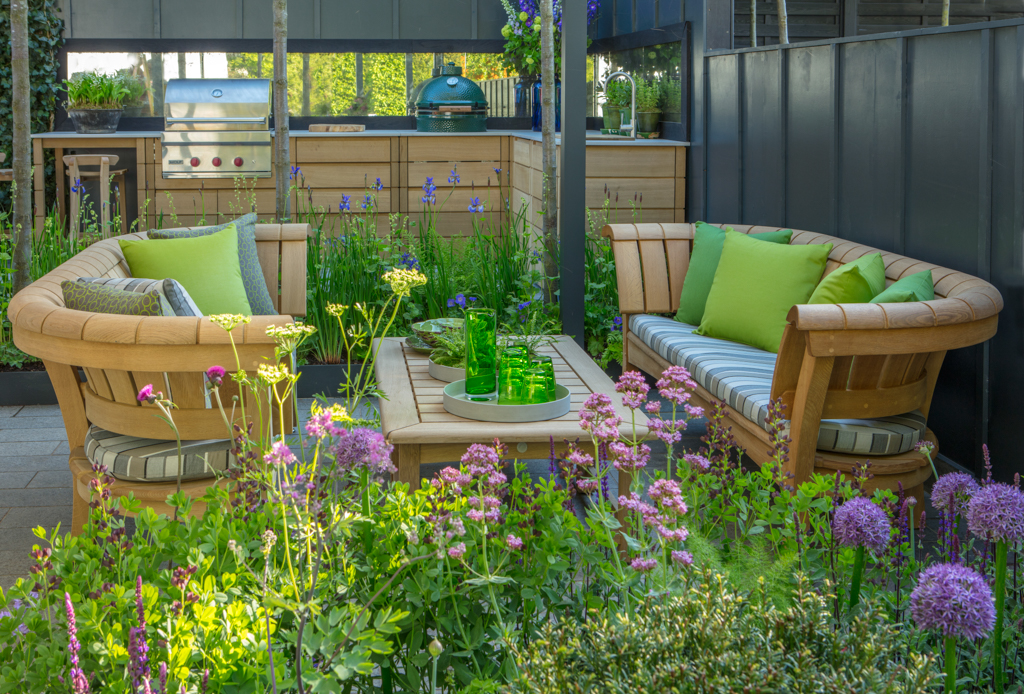 Outdoor lounging and outdoor kitchen at the Gaze Burvill stand at the RHS Chelsea Flower Show 2018