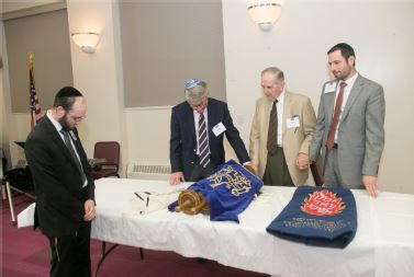 (L to R): Rabbi Rachmiel Rothberger, Jewish Community Liaison for the Hospital, Sirkman, Brescia, and Rabbi Shmuel Zuckerman, Jewish Chaplain for the Hospital.