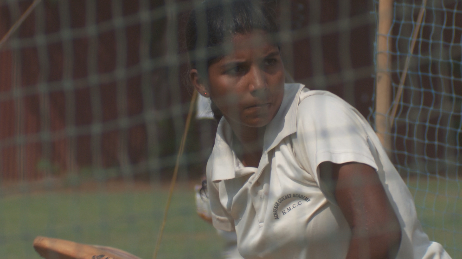 Kaikasha Mirza batting in cricket in "Purdah" from director Jeremy Guy