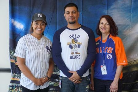 Staff members of Queens Medical Associates dressed for Strike Out Cancer Day