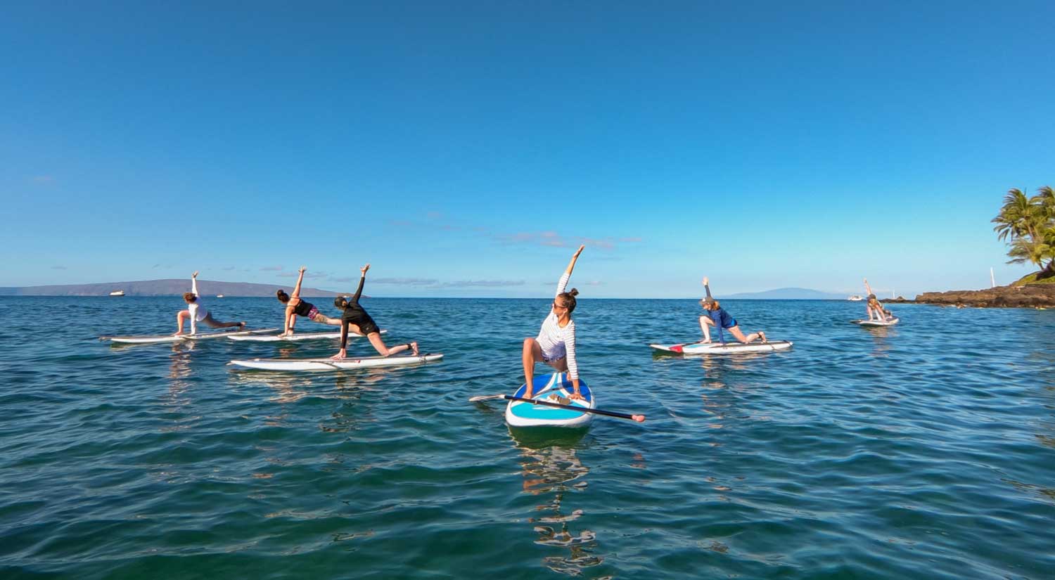 Backroads guests enjoy a yoga session before a day of hiking or biking