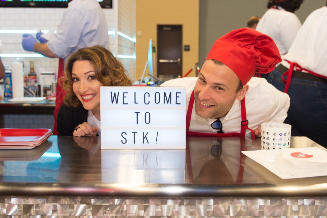 Co-founders of Sue's Tech Kitchen, Randi Zuckerberg and Jim Augustine, welcome guests to one of their recents pop-ups. (Credit: James Patterson)