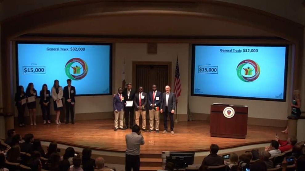The winning team on stage at the conclusion of the finals competition at the Global Social Innovation Challenge, at the University of San Diego.