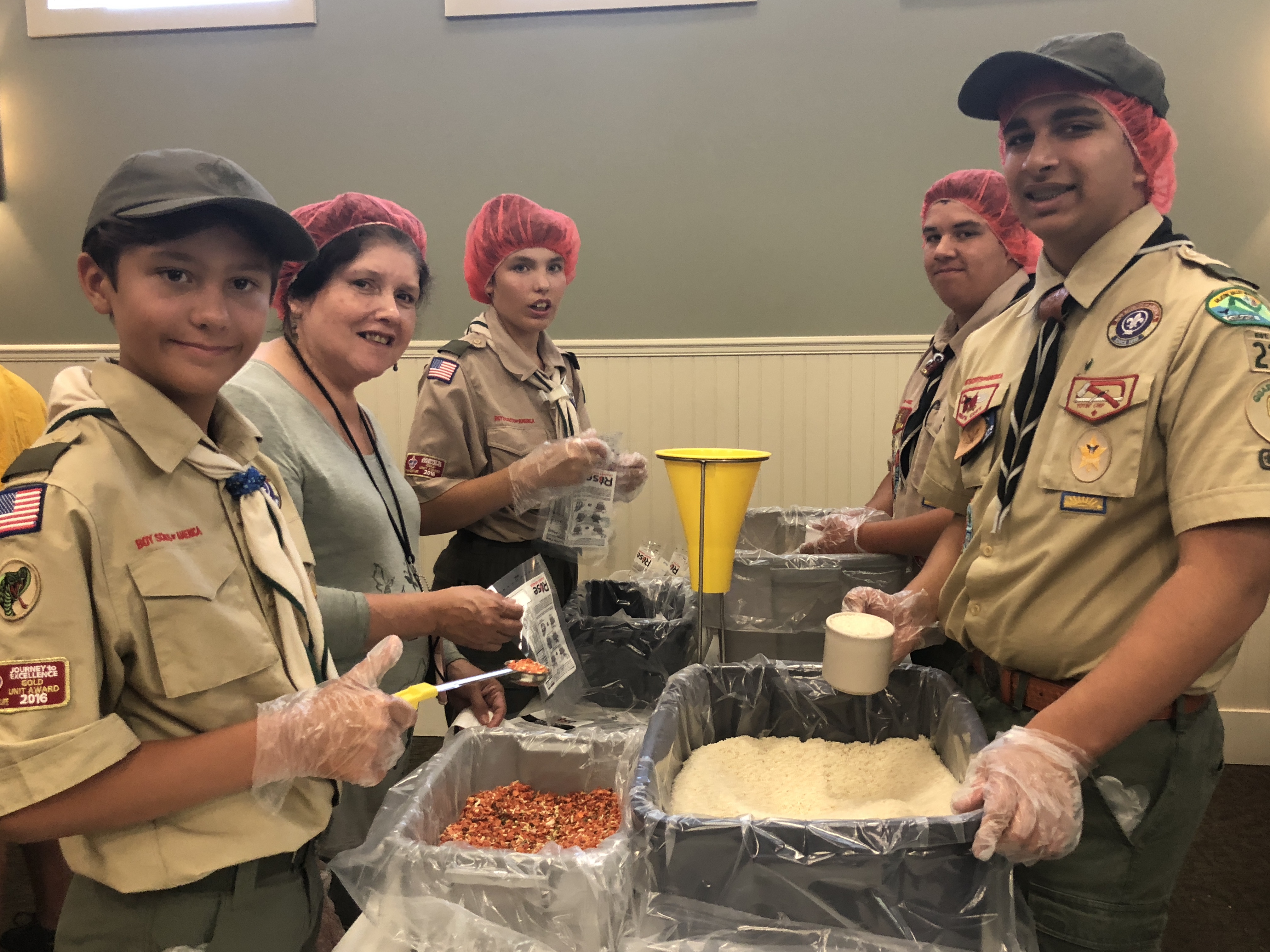 Scouts packaging Rise Against Hunger meals