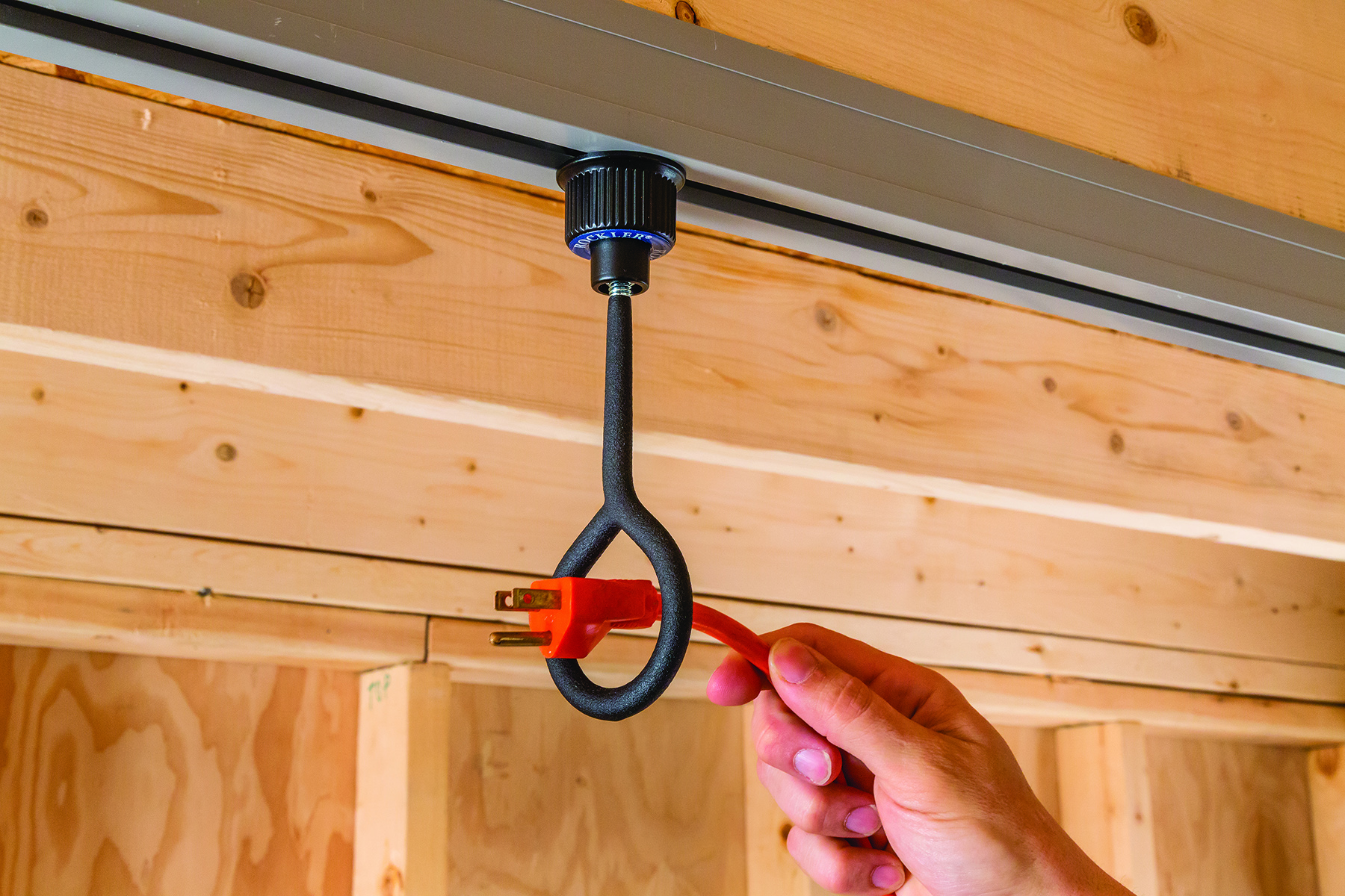 Rockler Ceiling Track attachments include a 1-1/2" inside-diameter ring hook that fits power cords and air hoses.