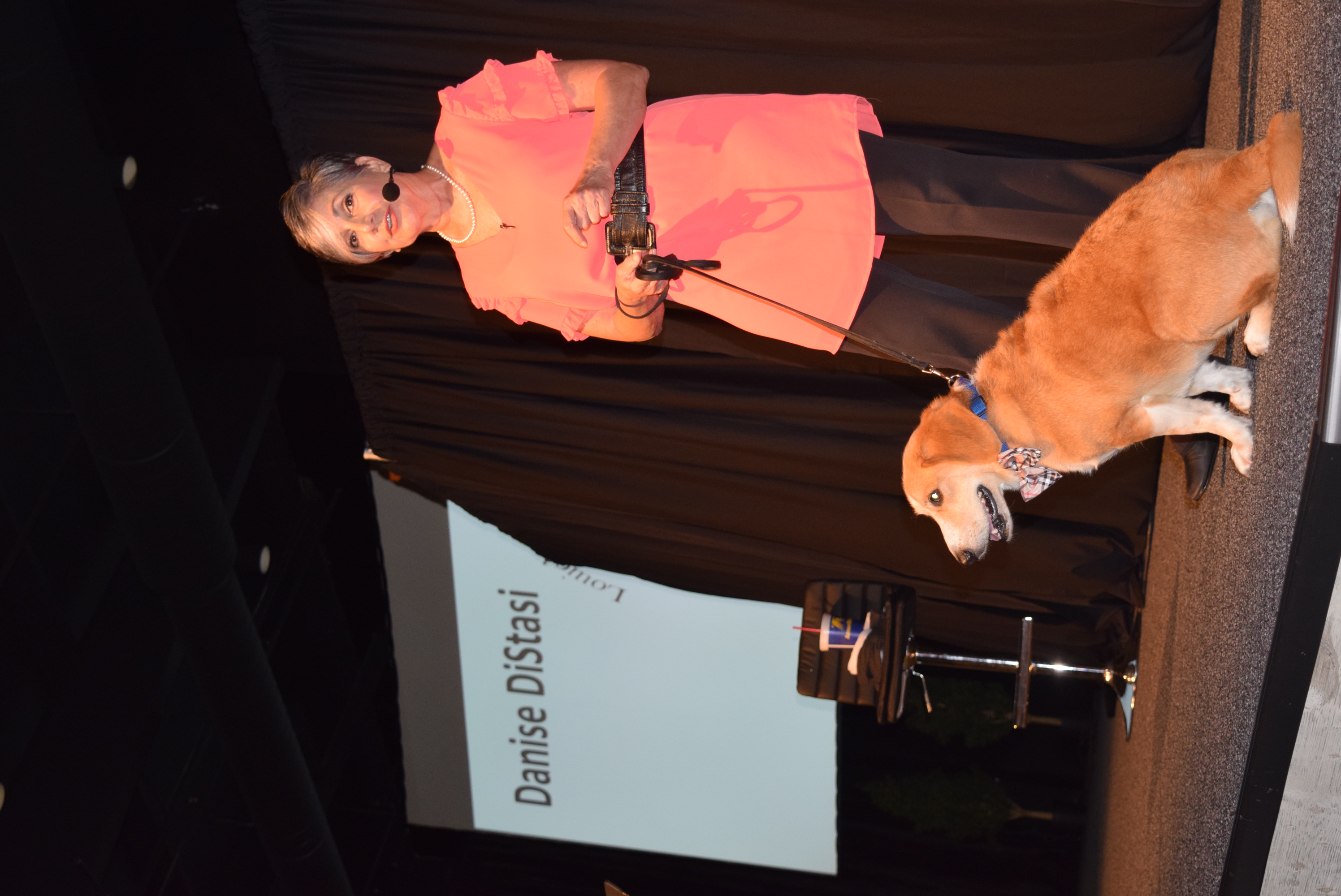 Danise DiStasi of DiStasi Advisors brought her dog, Louie, to the AWOP XL Summit to illustrate how love is at the root of building great leaders. (Oak Tree Communications Photo)