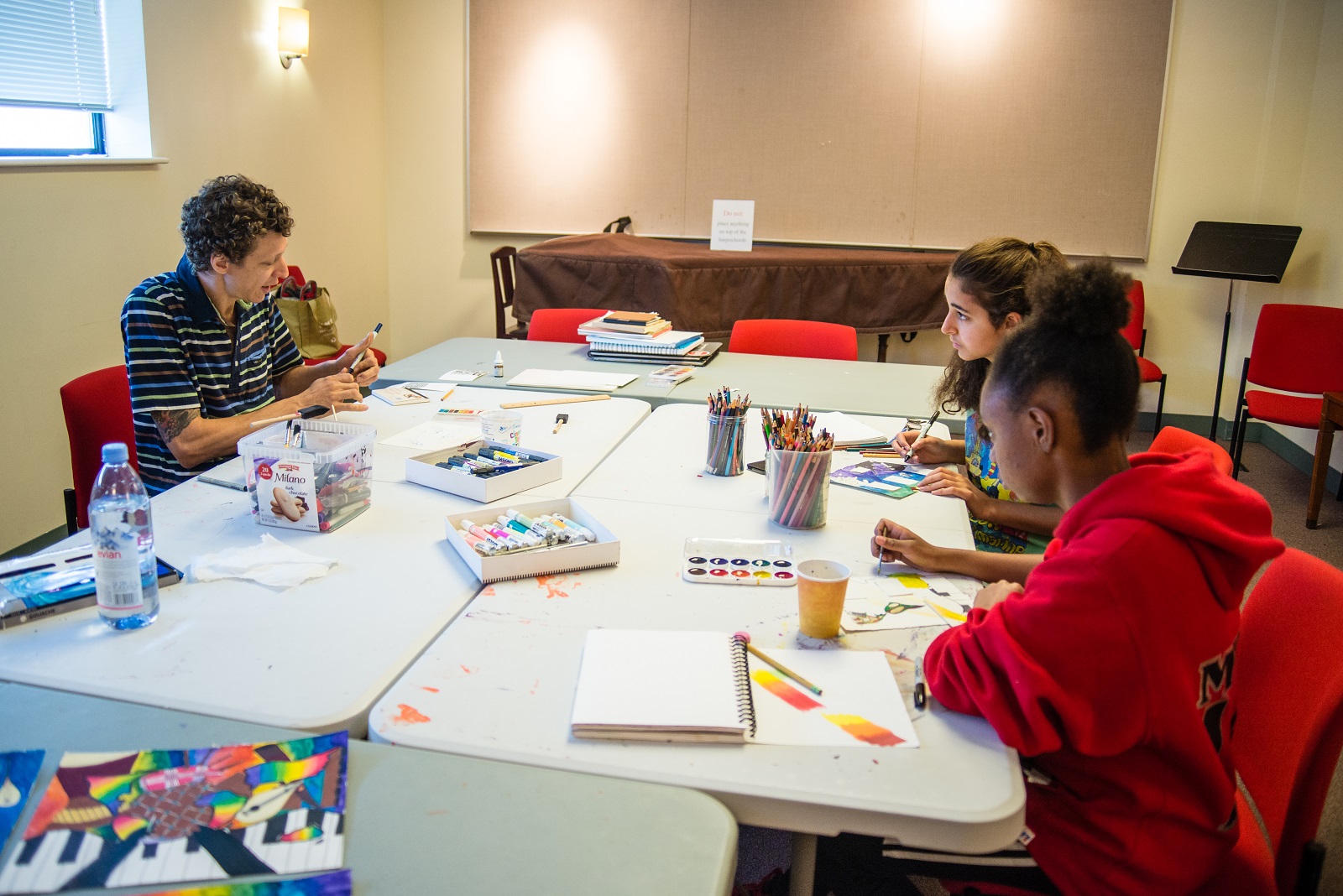 "Colors of Music" Student Mural Contest Winners Mya Madison Davis and Ciara Sergi Collaborate With Mural Artist and Workshop Mentor Jonathan Villoch at the Music Conservatory of Westchester