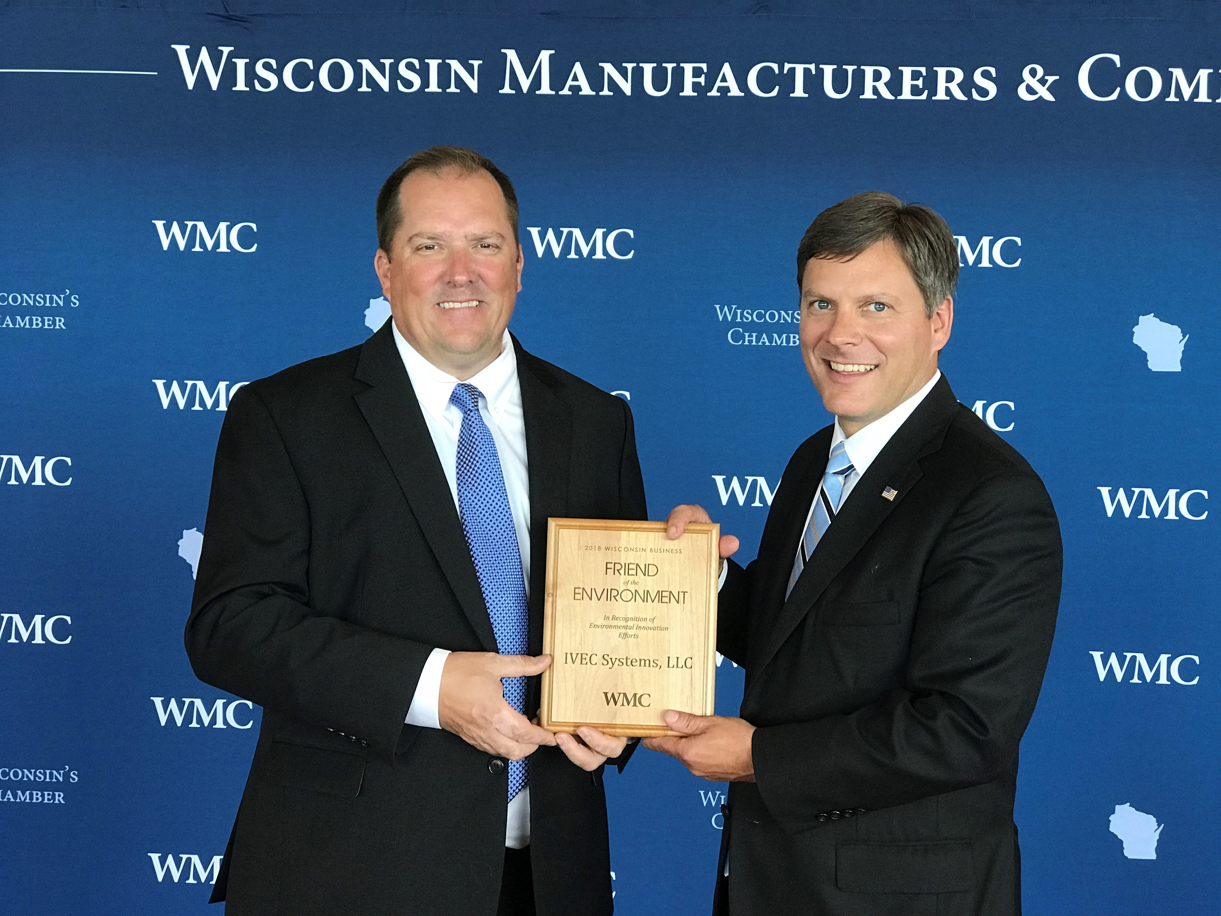 DuWayne Bohrer (left), Technical Director, accepted the Innovative Technology award on behalf of IVEC Systems in Madison, WI at WMC’s Policy Day from Kurt Bauer, President & CEO of WMC.