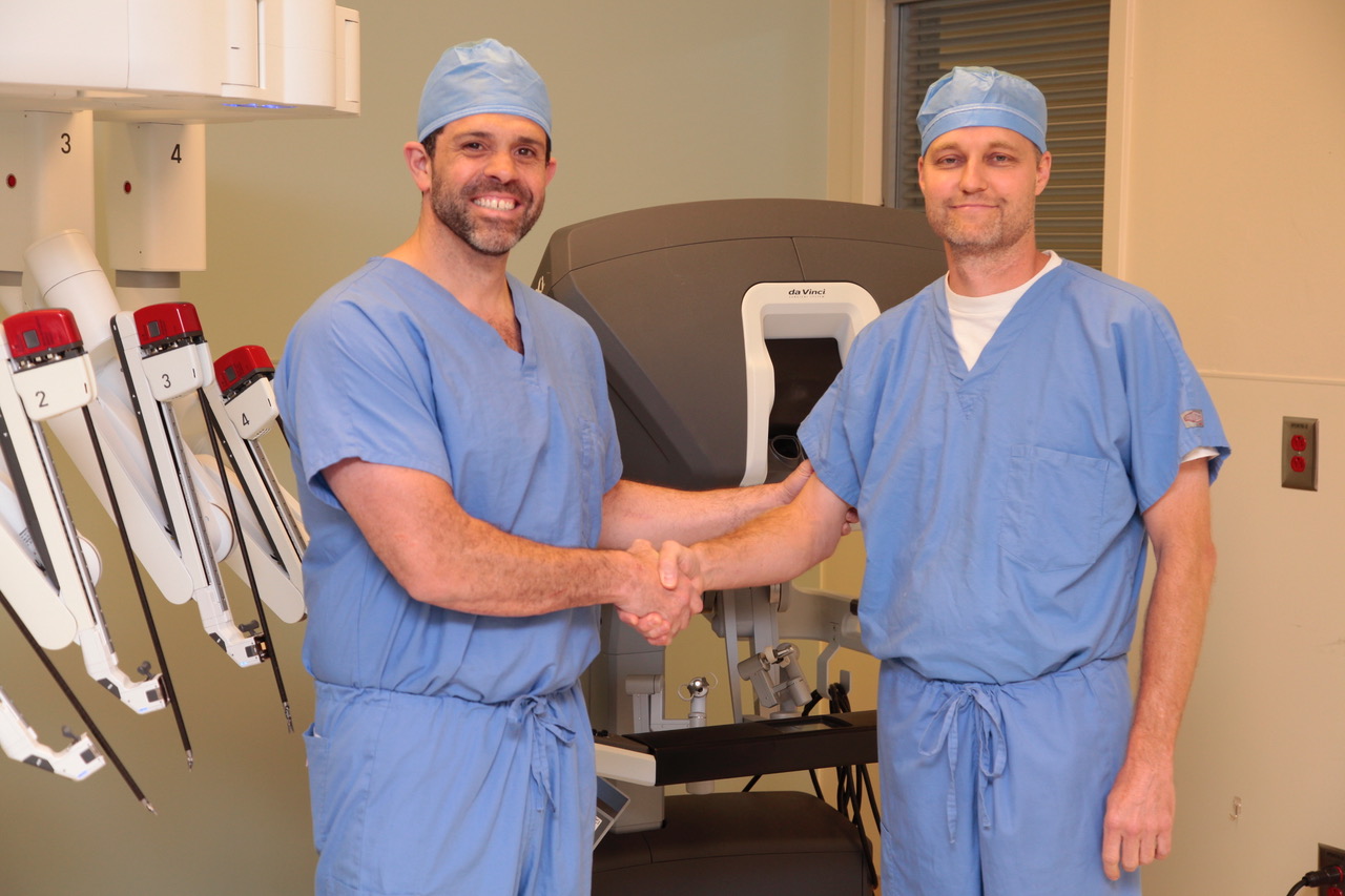 Drs. Froylan Gonzalez (left) and Brent Sharpe perform debut two new minimally-invasive robotic procedures at Northeast Georgia Medical Center in Braselton, Ga.