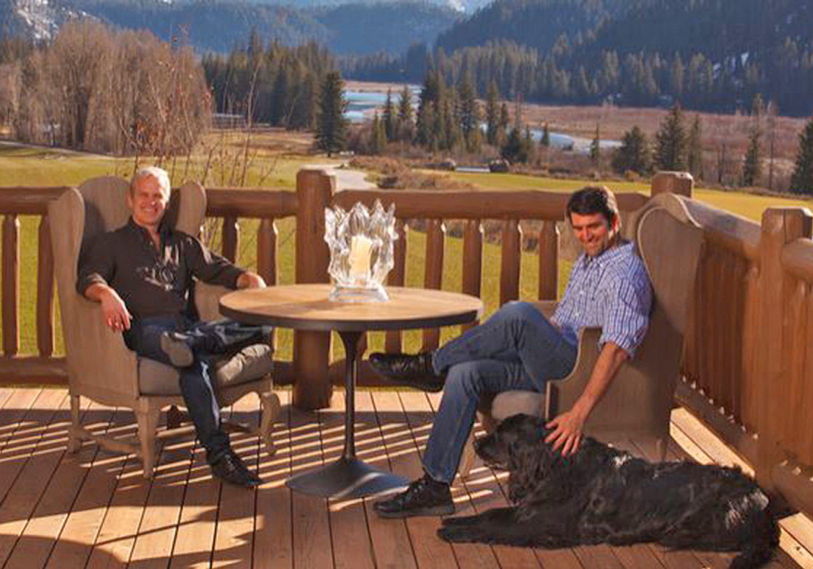 WRJ Design co-owners Rush Jenkins and Klaus Baer enjoy the Snake River Sporting Club’s outdoor deck that AD calls “a great place to relax in the shadow of the Tetons” (photo by David Swift).