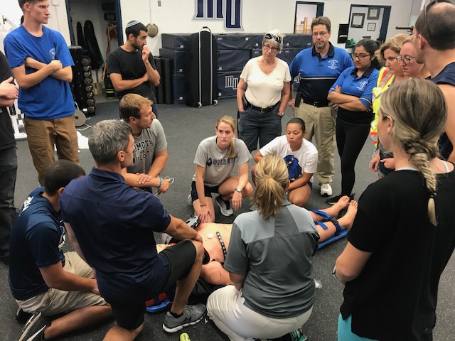Perfect practice make perfect: all involved participated in spine boarding and equipment removal in preparation for the upcoming season.