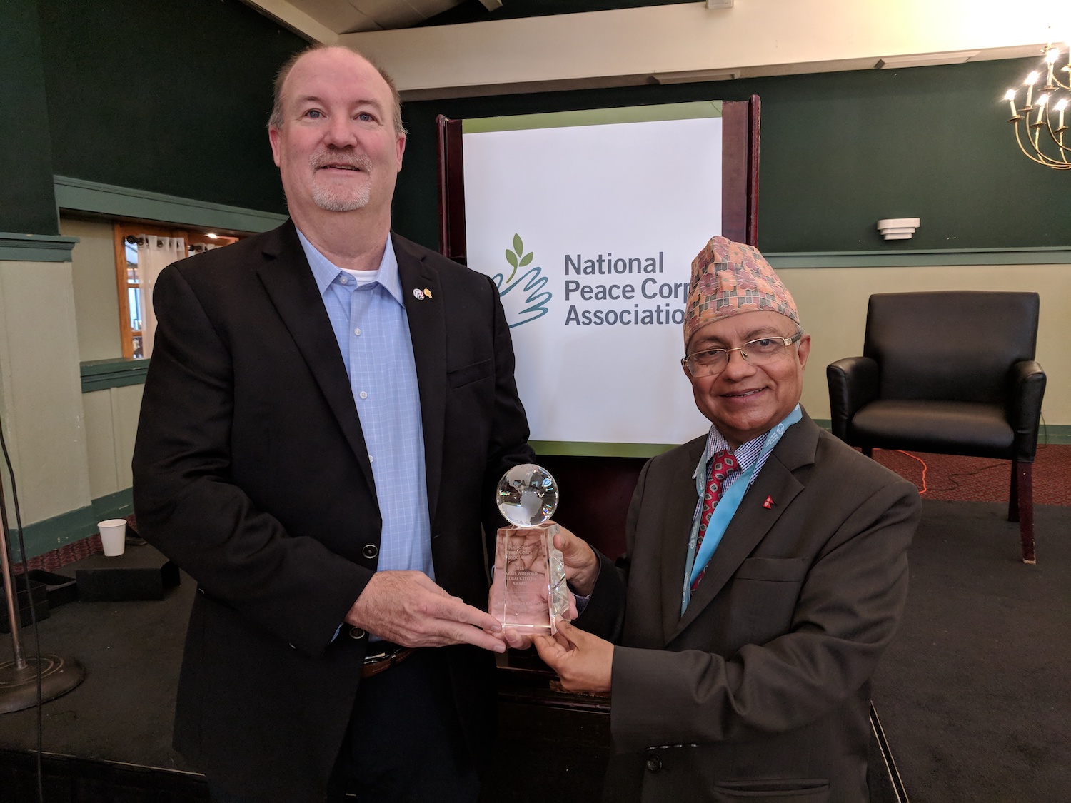 UN Nepali Diplomat Kul Gautam accepts Harris Wofford Global Citizenship Award from National Peace Corps Association President Glenn Blumhorst.