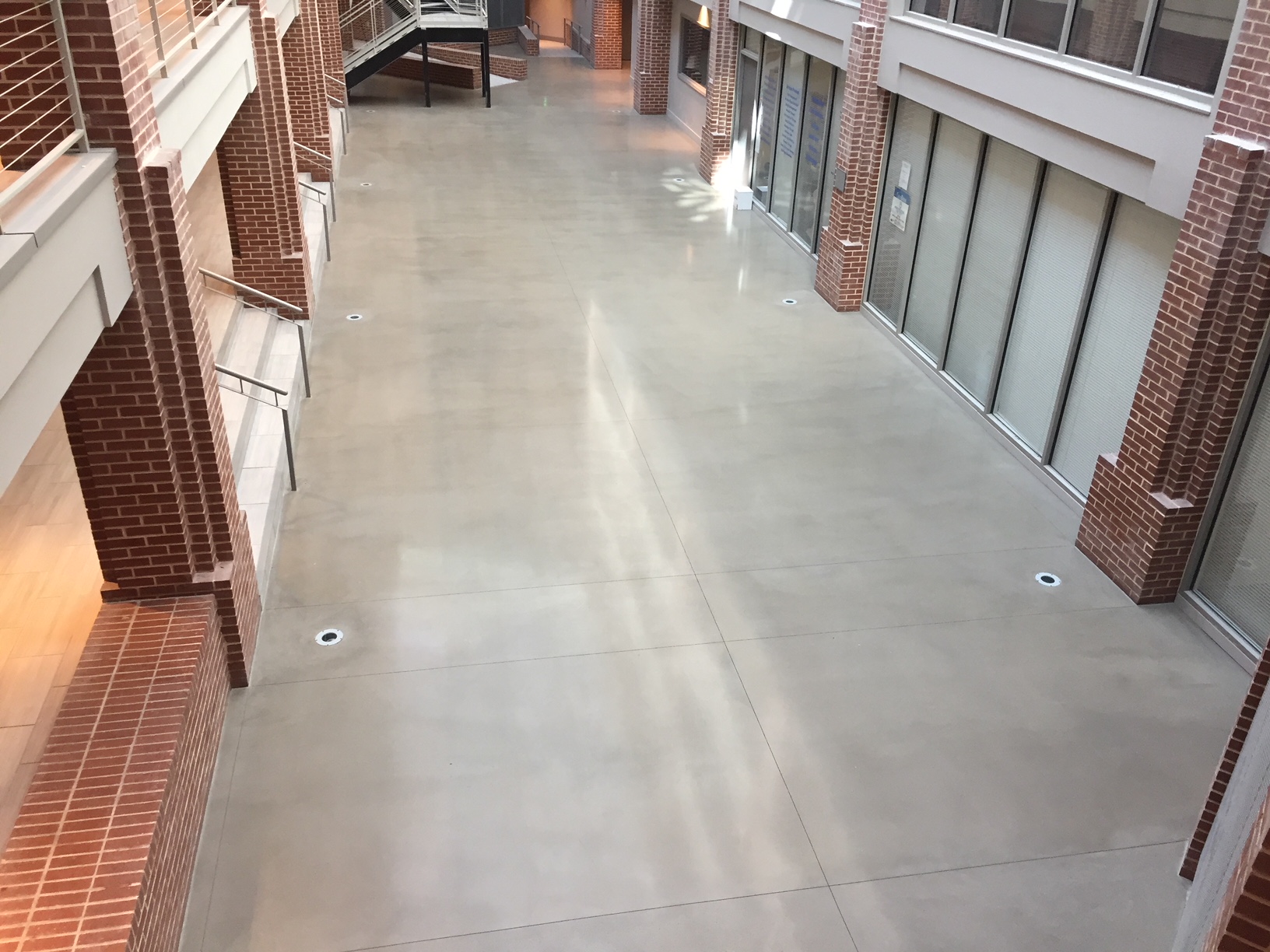 Gray is Good: The “Penetron Self-Leveling Topping Workshop” taught the correct procedures for polishing, densifying and sealing the RENEW WS flooring overlay – for a bright, glossy finish.