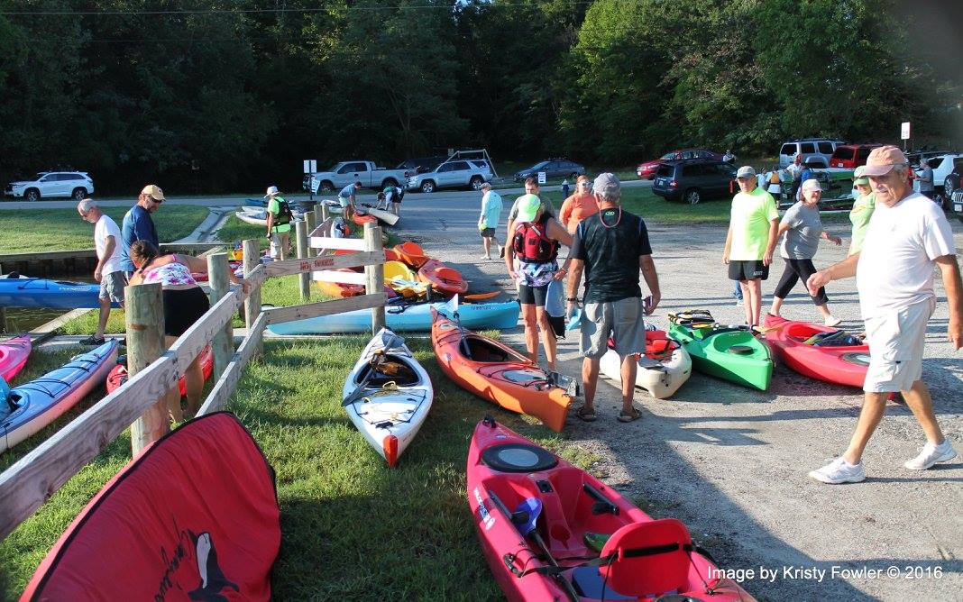Paddlers assemble their canoes for the annual Paddle or Battle Race on the Appomattox River in Hopewell-Prince George VA.