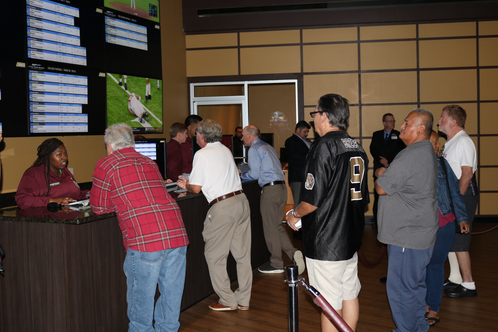 Guests line up to place wagers at The Sportsbook at Golden Moon Casino