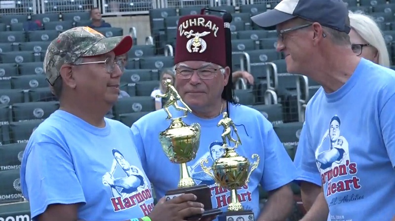 Tony Hintz (left) receives Harmon's Heart of Baseball Award
