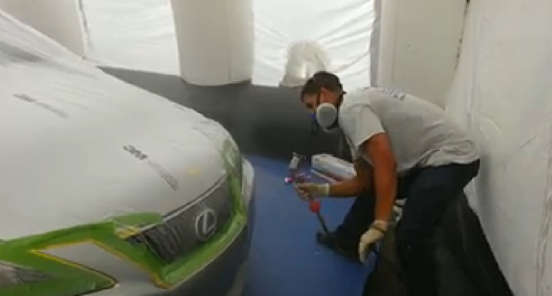 Spraying a bumper inside a FAST Shelter